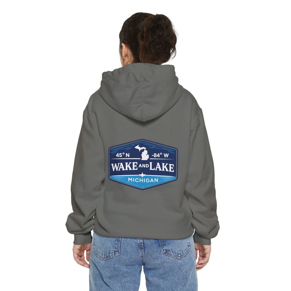 Wake and Lake Life Circle Crest Hoodie Light worn on a summer boat morning
Light-colored lake life sweatshirt with circle crest graphic
Natural white or sand lake hoodie for warm summer days
Soft light fleece with Wake and Lake circle crest design

