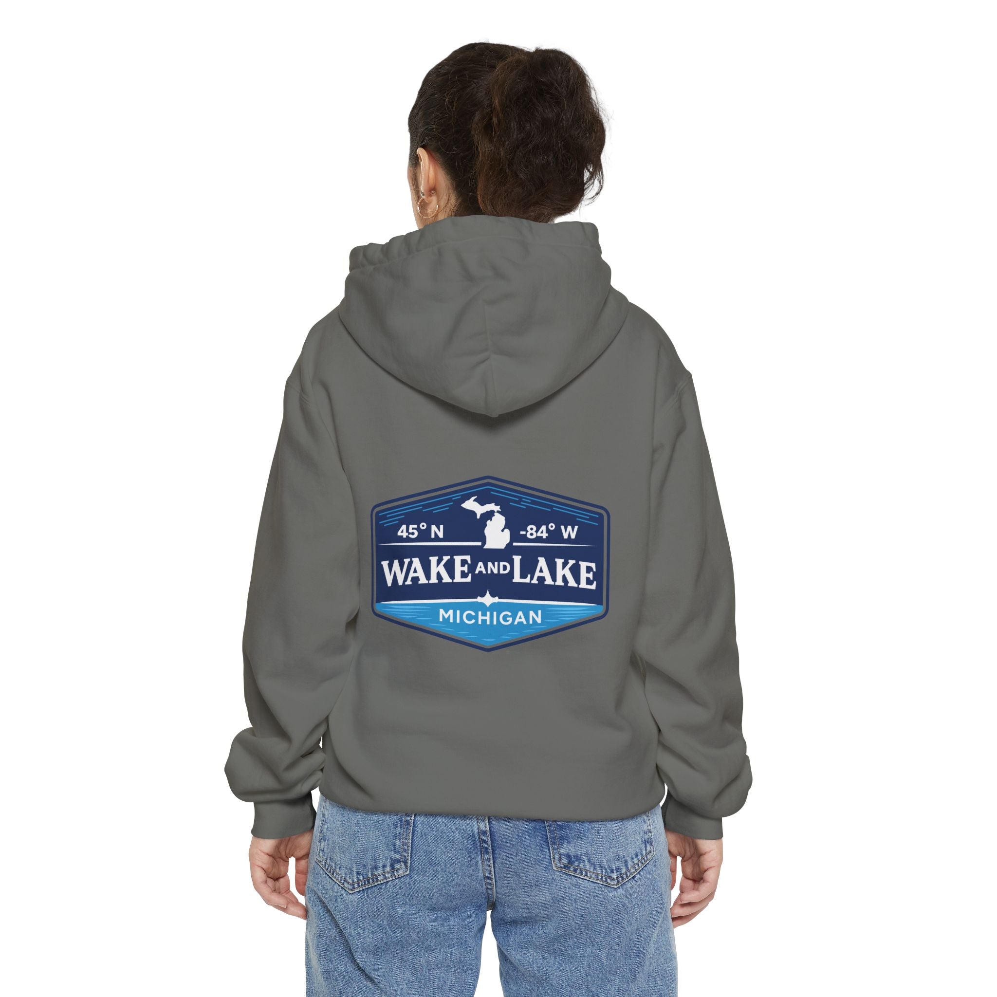 Wake and Lake Life Circle Crest Hoodie Light worn on a summer boat morning
Light-colored lake life sweatshirt with circle crest graphic
Natural white or sand lake hoodie for warm summer days
Soft light fleece with Wake and Lake circle crest design

