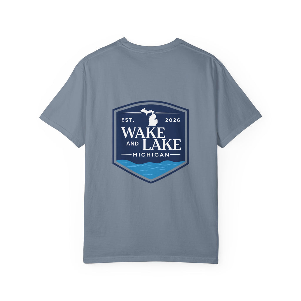 Wake and Lake Michigan Shield Tee worn on a Great Lakes dock
Bold Michigan crest graphic t-shirt for lake life
Michigan boating shirt with Wake and Lake shield logo
Unisex cotton tee with Michigan state pride lake graphic
