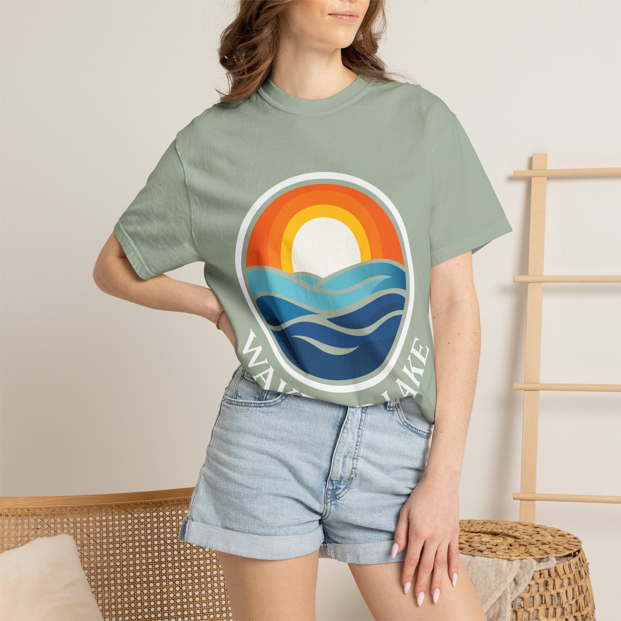 Wake and Lake Life Circle Crest Tee worn on a dock at sunset
Soft unisex lake life tee with bold circle crest graphic
Wake and Lake branded cotton t-shirt for summer boating
Circle crest logo tee for lake days and outdoor weekends

