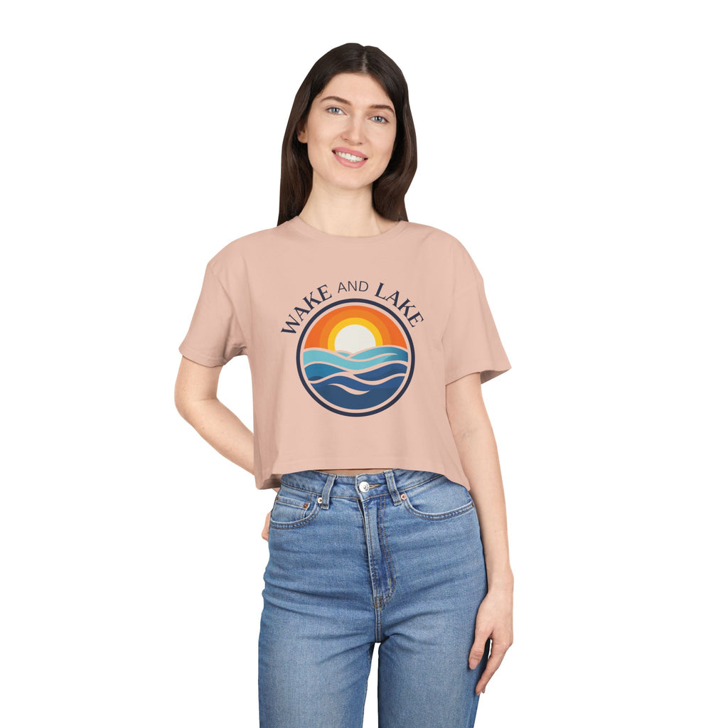 Wake and Lake Michigan Shield Women's Crop Tee on a boat deck
Relaxed crop top with Michigan crest graphic for lake days
Women's breezy boating crop tee with Wake and Lake Michigan branding
Soft women's Michigan Great Lakes crop t-shirt relaxed fit
