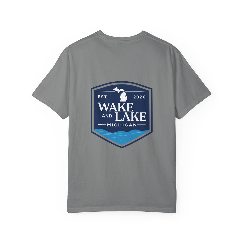 Wake and Lake Michigan Shield Tee worn on a Great Lakes dock
Bold Michigan crest graphic t-shirt for lake life
Michigan boating shirt with Wake and Lake shield logo
Unisex cotton tee with Michigan state pride lake graphic
