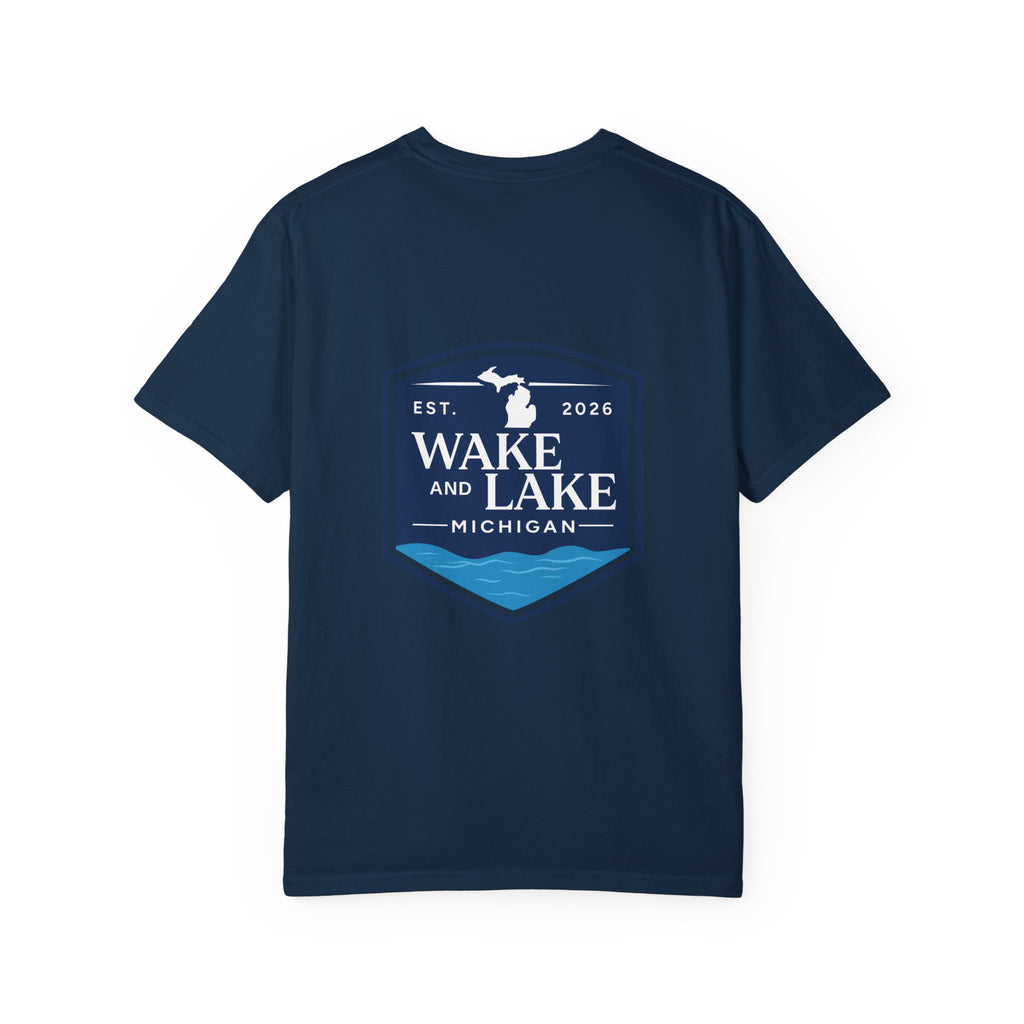 Wake and Lake Michigan Shield Tee worn on a Great Lakes dock
Bold Michigan crest graphic t-shirt for lake life
Michigan boating shirt with Wake and Lake shield logo
Unisex cotton tee with Michigan state pride lake graphic
