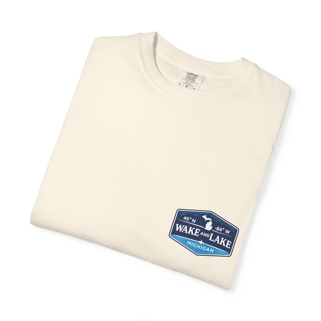Wake and Lake Michigan Shield Tee worn on a Great Lakes dock
Bold Michigan crest graphic t-shirt for lake life
Michigan boating shirt with Wake and Lake shield logo
Unisex cotton tee with Michigan state pride lake graphic
