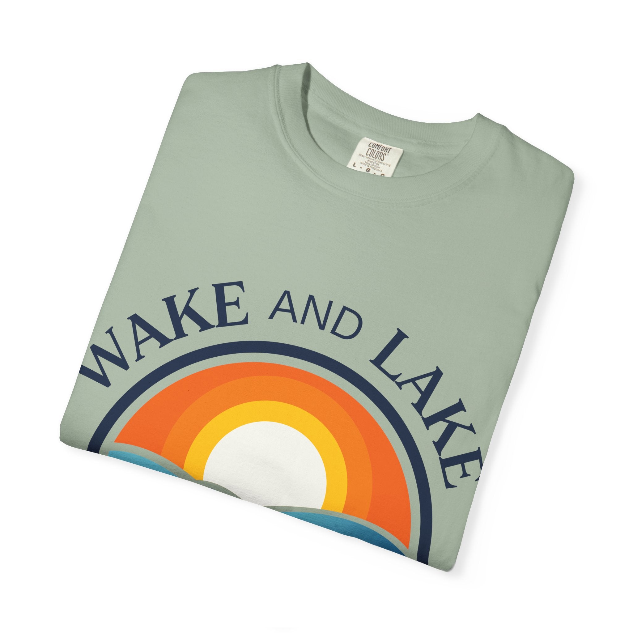 Wake and Lake Life Circle Crest Tee light color on a sunny lake day
White or sand-colored unisex lake t-shirt with circle crest logo
Light summer boating shirt with Wake and Lake branding
Breathable cotton lake life tee in light colorway
