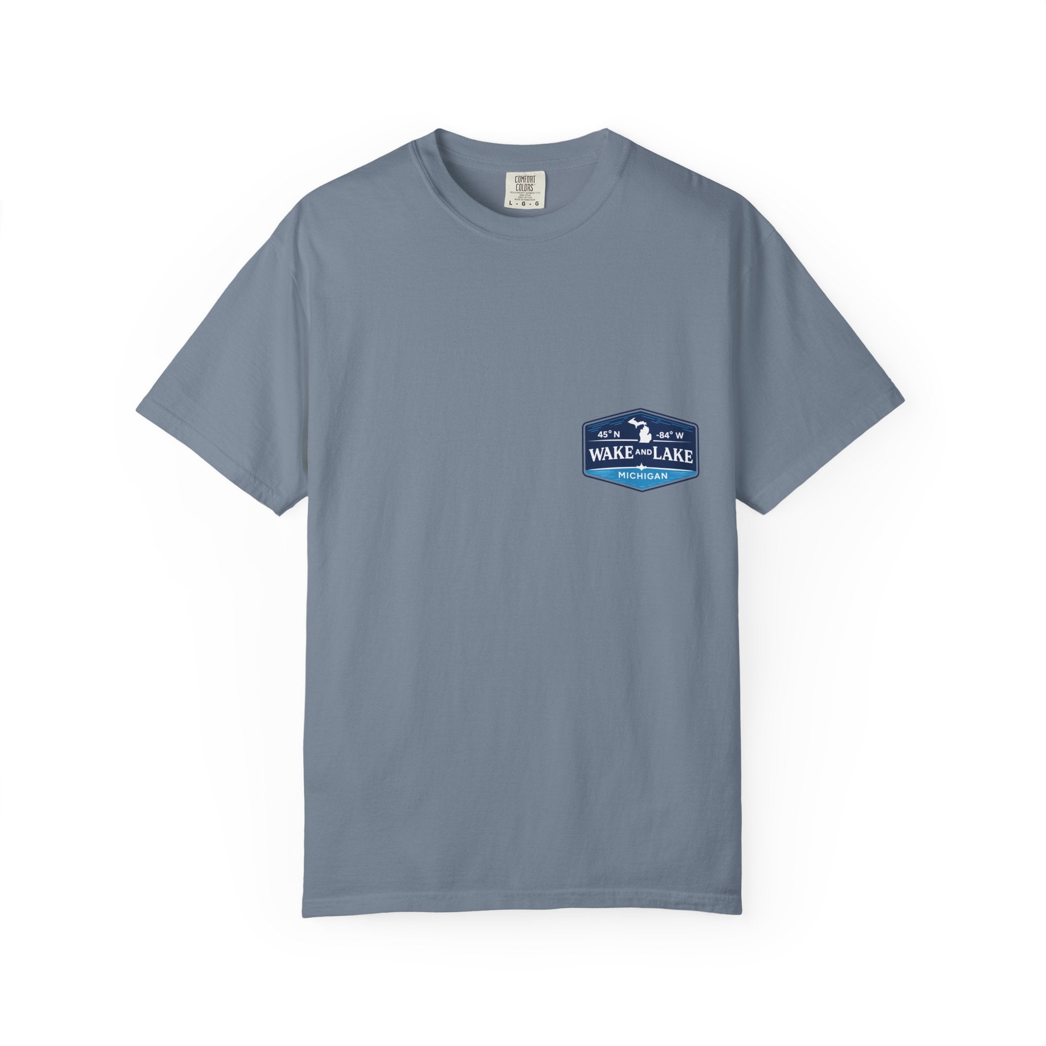 Wake and Lake Michigan Shield Tee worn on a Great Lakes dock
Bold Michigan crest graphic t-shirt for lake life
Michigan boating shirt with Wake and Lake shield logo
Unisex cotton tee with Michigan state pride lake graphic

