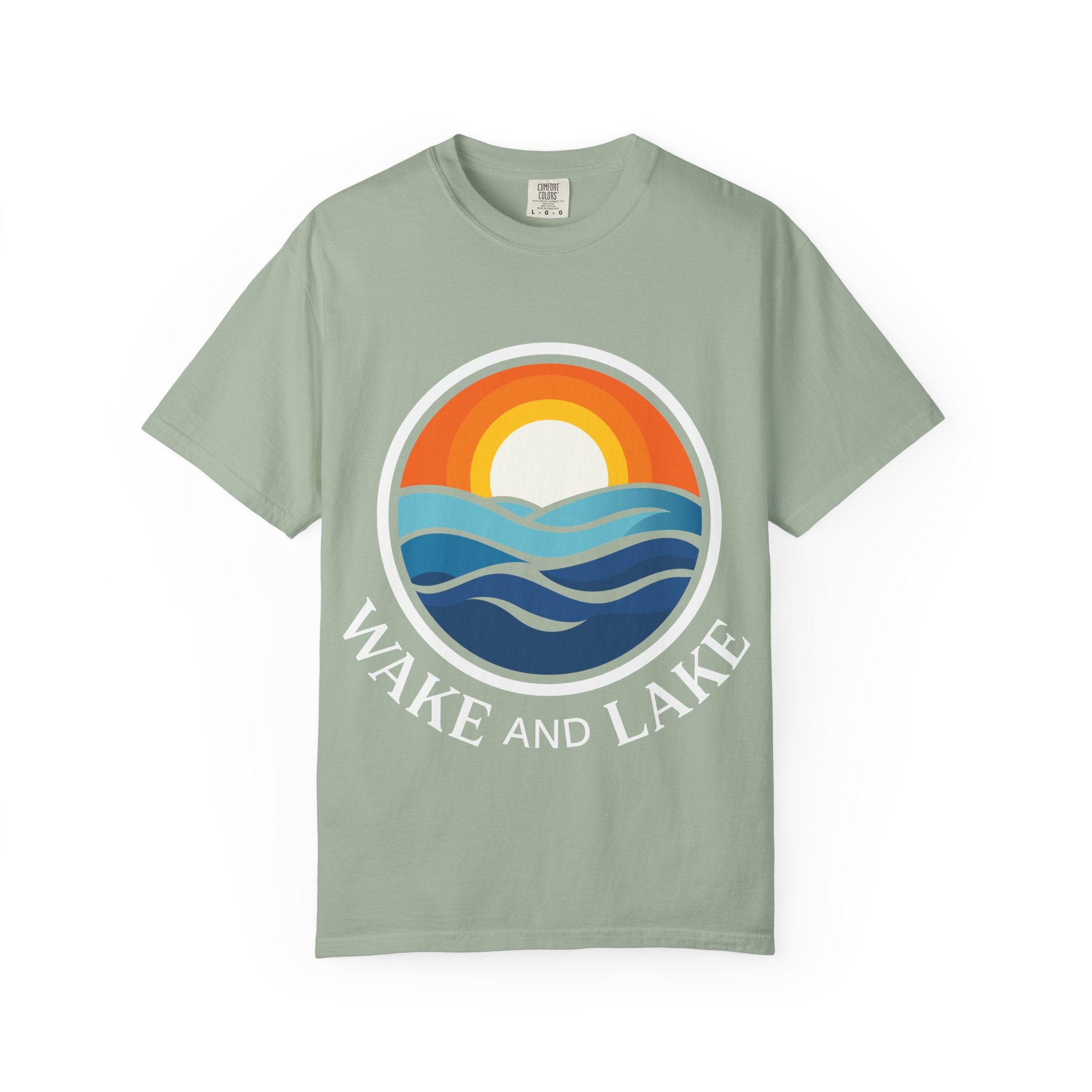 Wake and Lake Life Circle Crest Tee worn on a dock at sunset
Soft unisex lake life tee with bold circle crest graphic
Wake and Lake branded cotton t-shirt for summer boating
Circle crest logo tee for lake days and outdoor weekends

