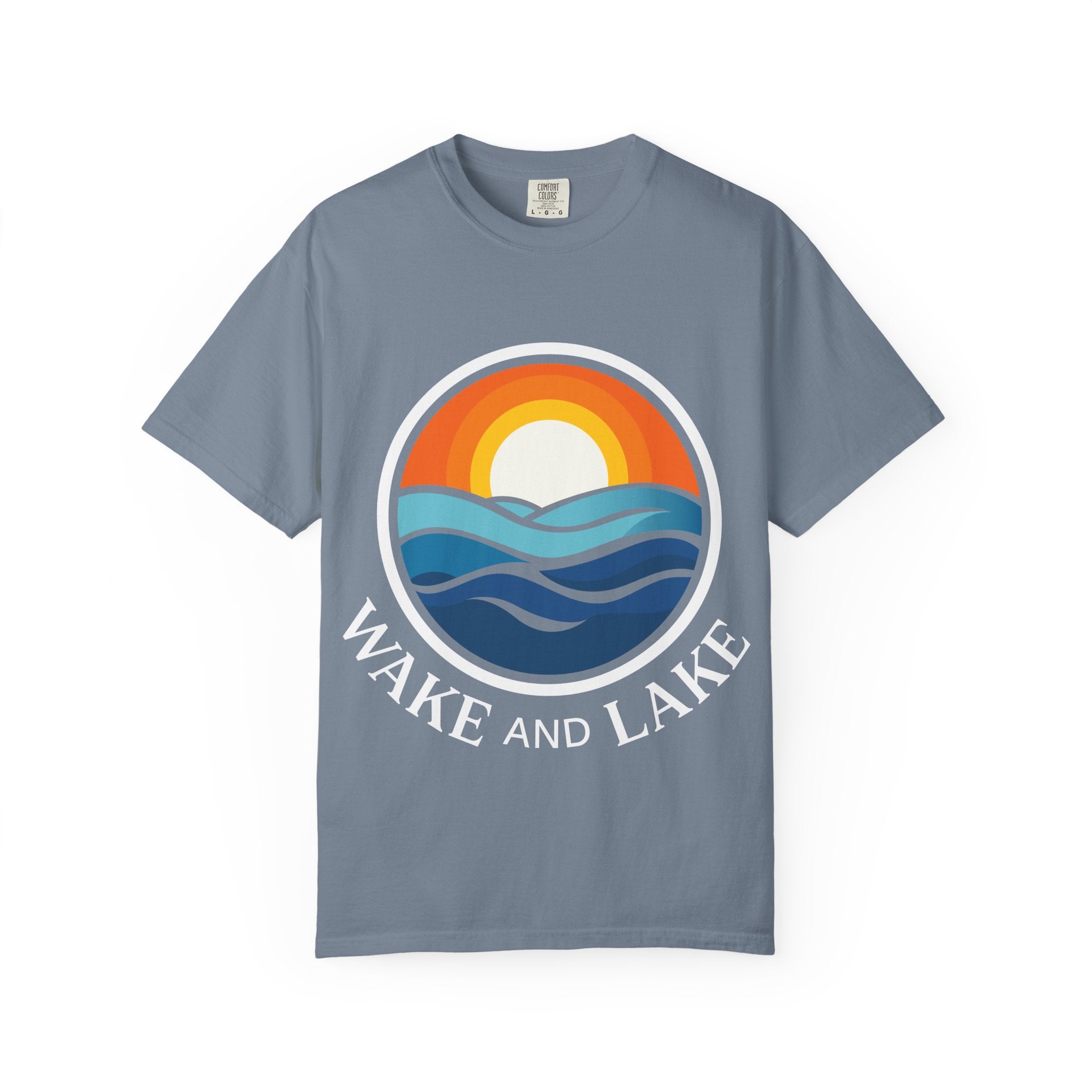 Wake and Lake Life Circle Crest Tee worn on a dock at sunset
Soft unisex lake life tee with bold circle crest graphic
Wake and Lake branded cotton t-shirt for summer boating
Circle crest logo tee for lake days and outdoor weekends

