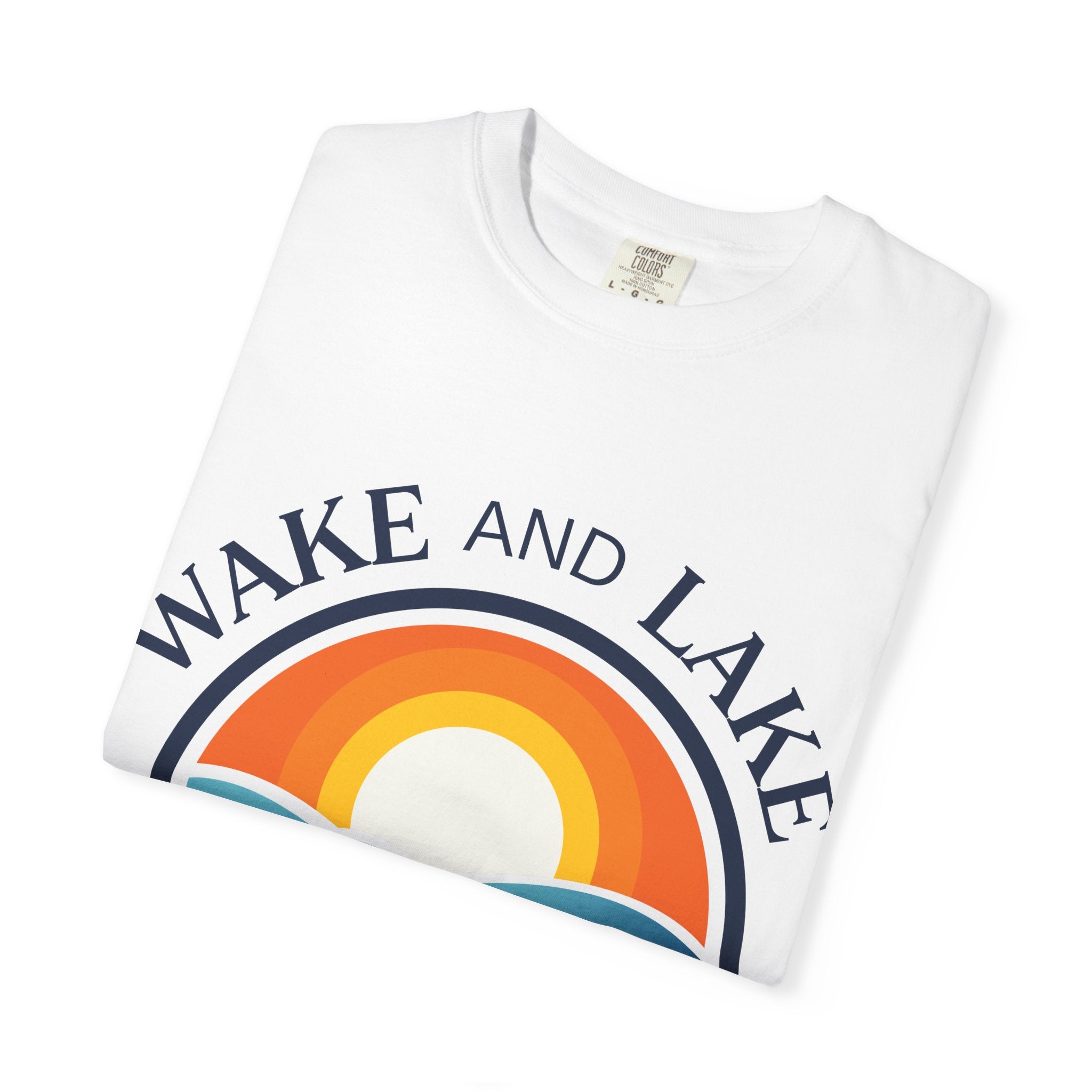Wake and Lake Life Circle Crest Tee light color on a sunny lake day
White or sand-colored unisex lake t-shirt with circle crest logo
Light summer boating shirt with Wake and Lake branding
Breathable cotton lake life tee in light colorway
