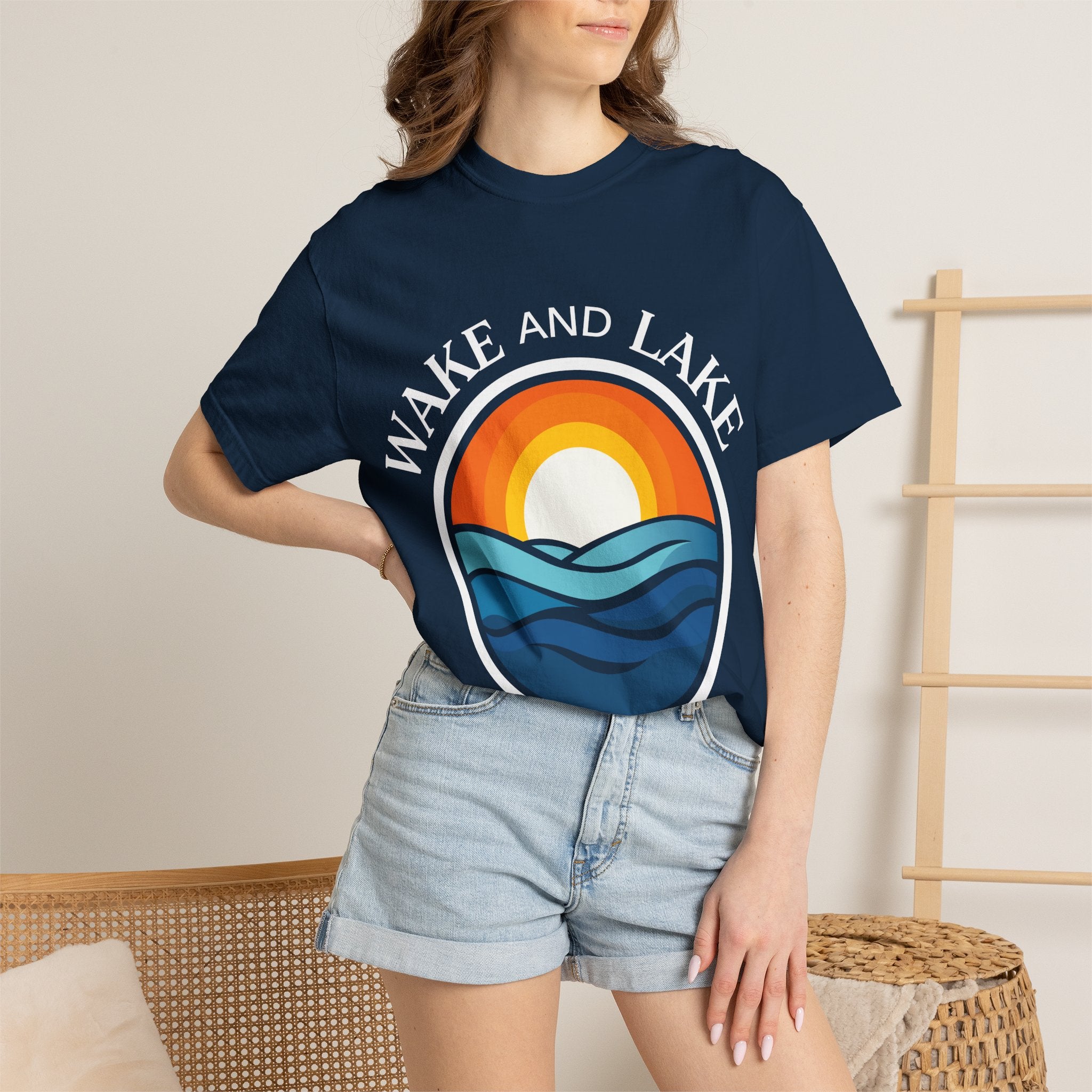Wake and Lake Circle Crest Arch Tee worn at a lake dock
Lake life t-shirt with arch circle crest logo graphic
Soft unisex summer boating tee with arch design
Wake and Lake branded arch graphic cotton shirt
