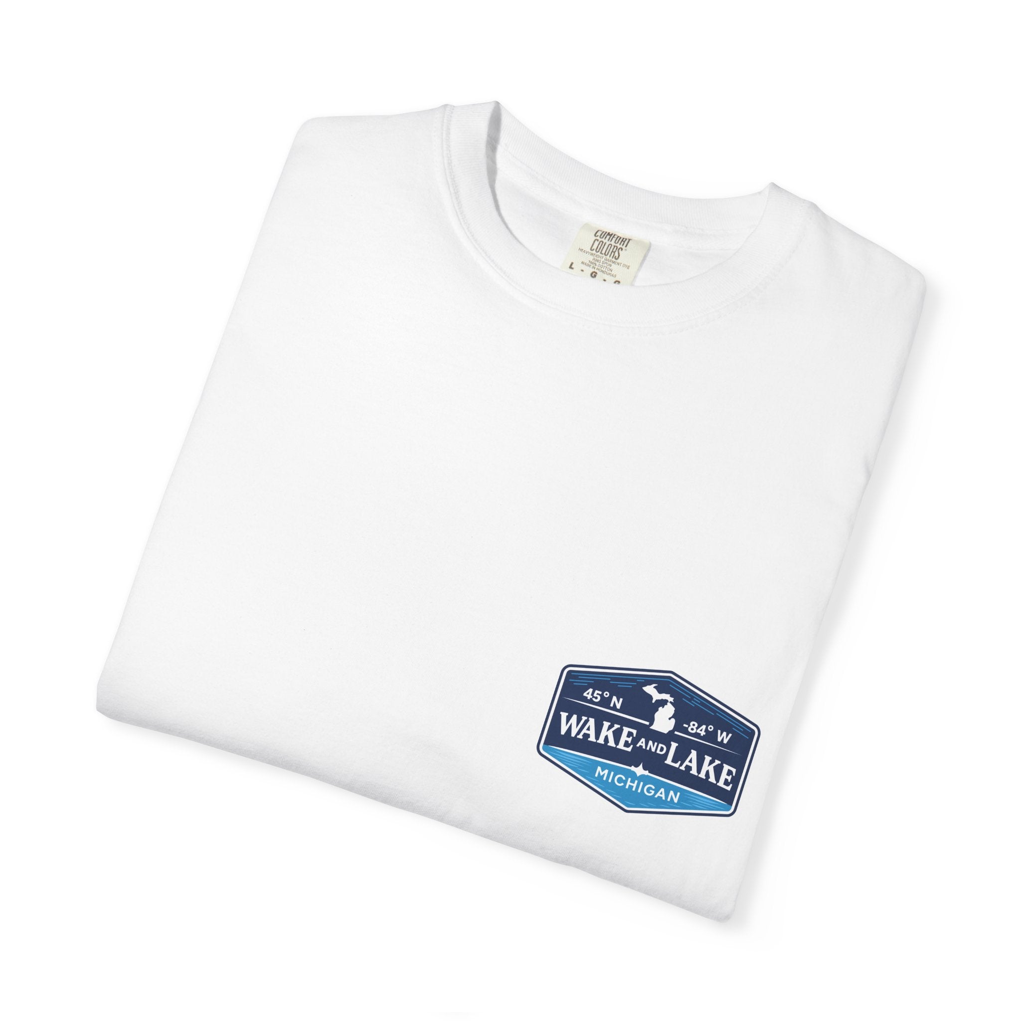 Wake and Lake Michigan Shield Tee worn on a Great Lakes dock
Bold Michigan crest graphic t-shirt for lake life
Michigan boating shirt with Wake and Lake shield logo
Unisex cotton tee with Michigan state pride lake graphic
