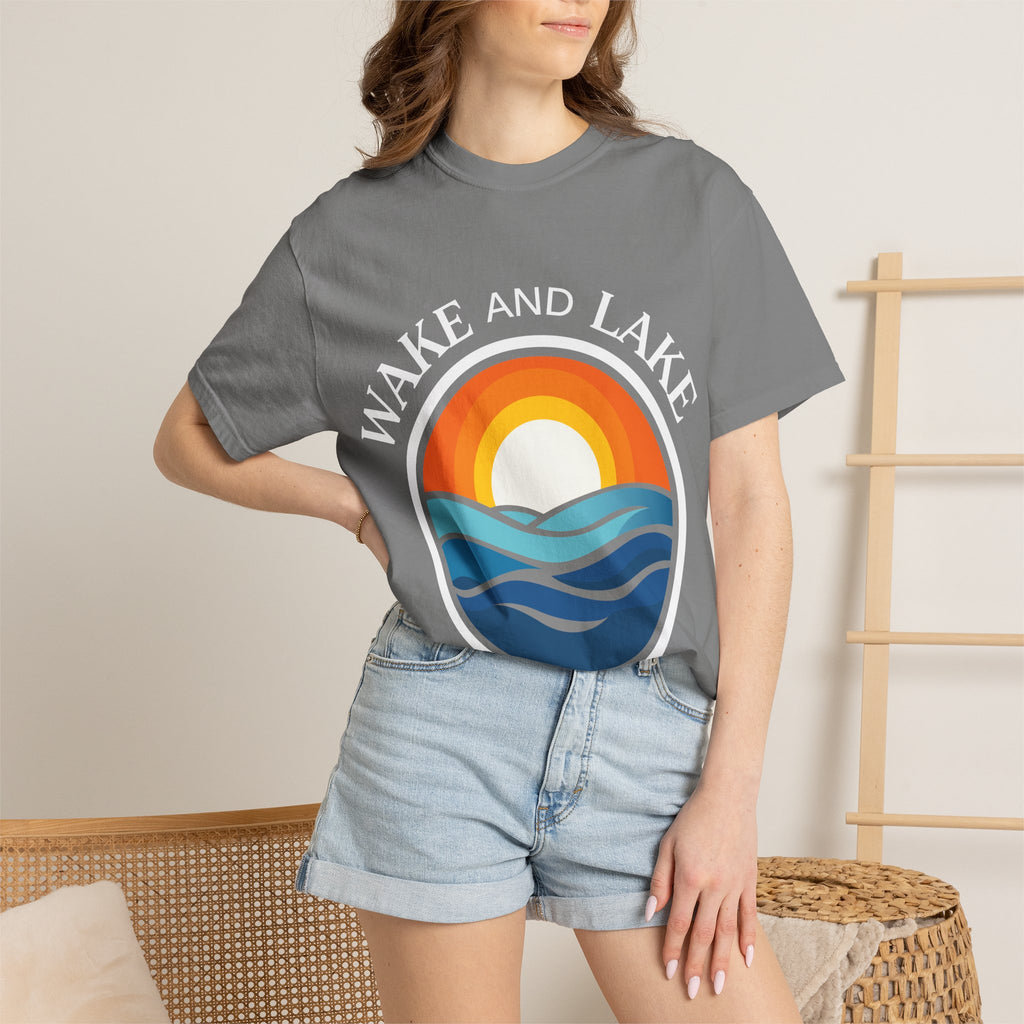Wake and Lake Circle Crest Arch Tee worn at a lake dock
Lake life t-shirt with arch circle crest logo graphic
Soft unisex summer boating tee with arch design
Wake and Lake branded arch graphic cotton shirt
