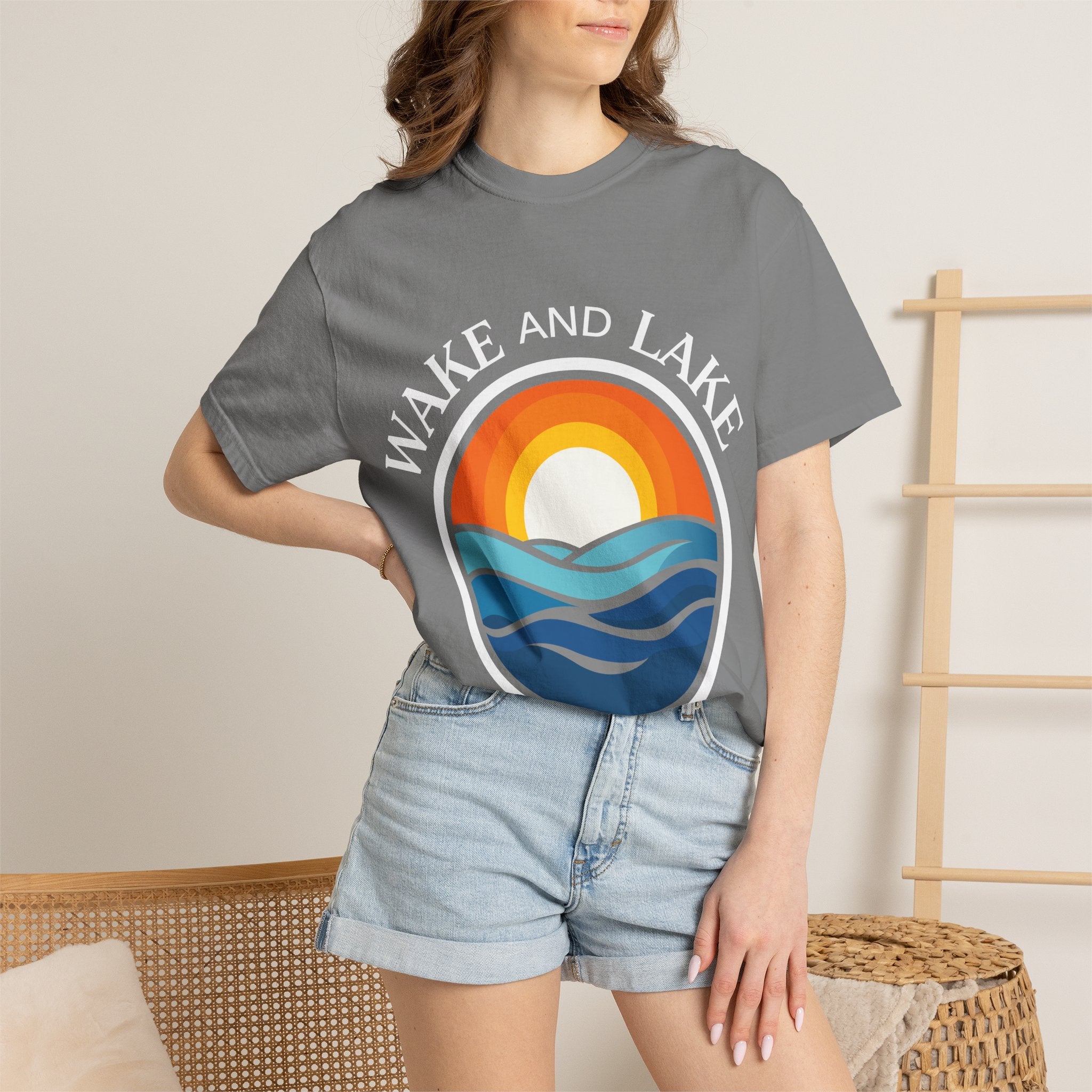 Wake and Lake Circle Crest Arch Tee worn at a lake dock
Lake life t-shirt with arch circle crest logo graphic
Soft unisex summer boating tee with arch design
Wake and Lake branded arch graphic cotton shirt
