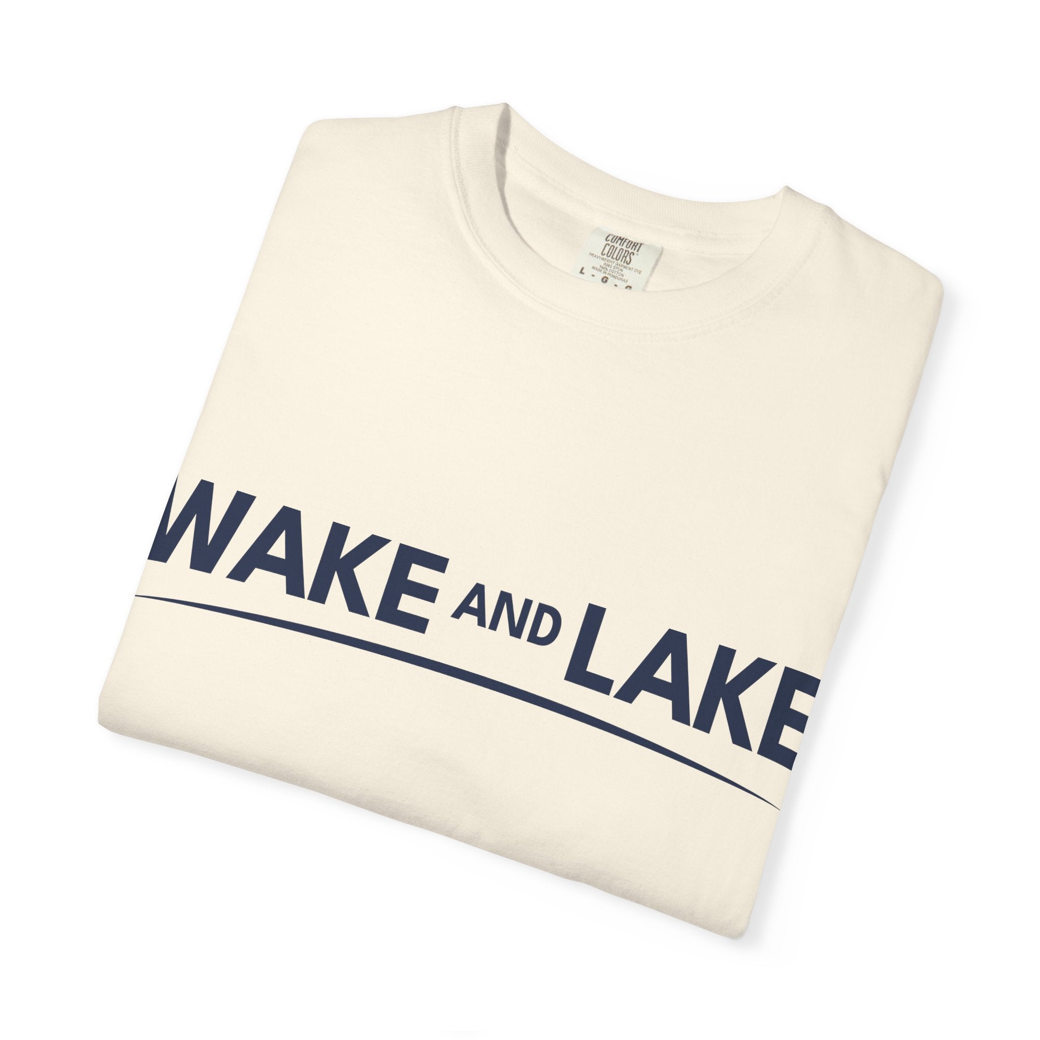 Wake and Lake Wordmark Tee worn at lakeside bonfire
Soft unisex cotton lake life t-shirt with chest wordmark
Wake and Lake branded everyday tee for boating weekends
Lake apparel t-shirt with clean Wake and Lake graphic


