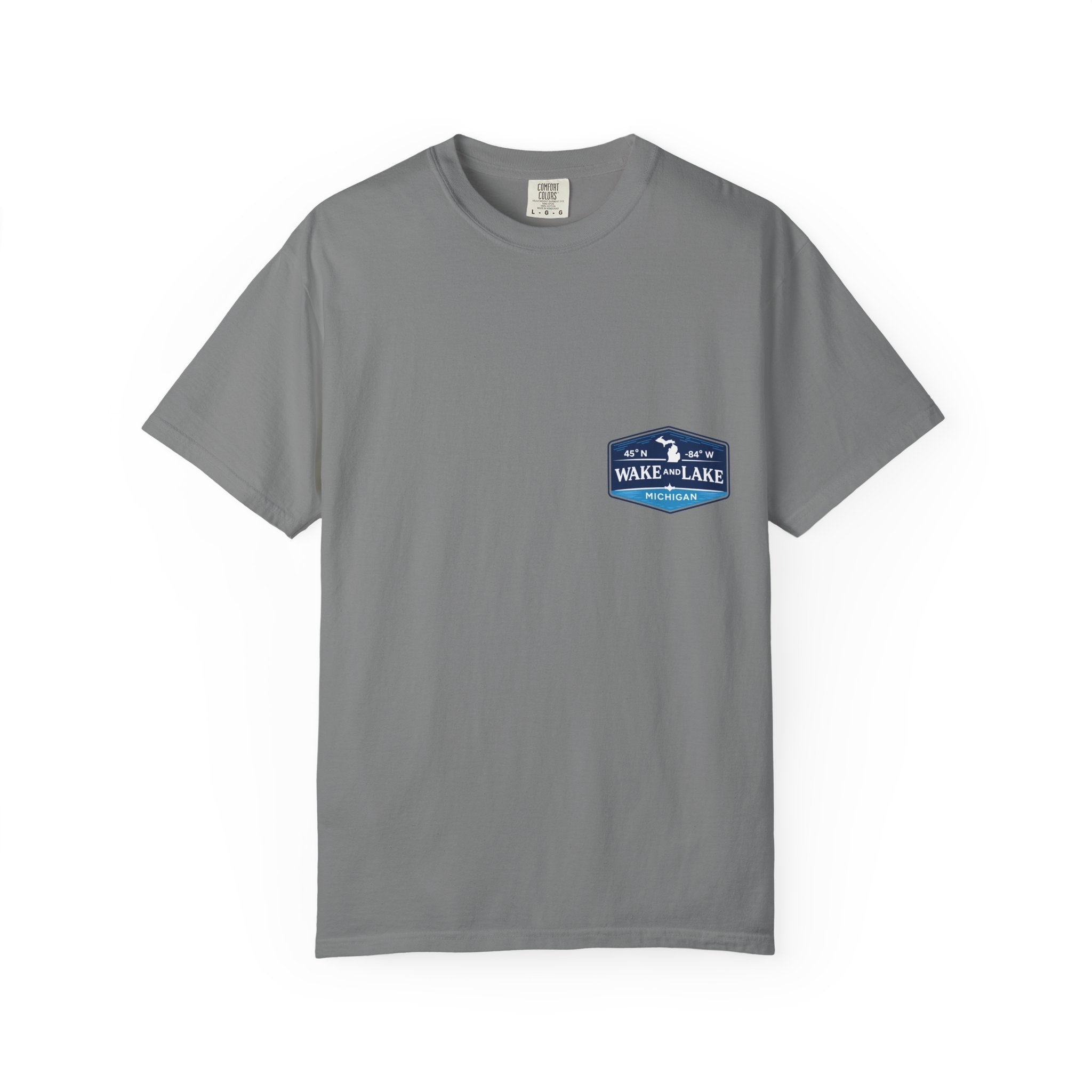Wake and Lake Michigan Shield Tee worn on a Great Lakes dock
Bold Michigan crest graphic t-shirt for lake life
Michigan boating shirt with Wake and Lake shield logo
Unisex cotton tee with Michigan state pride lake graphic
