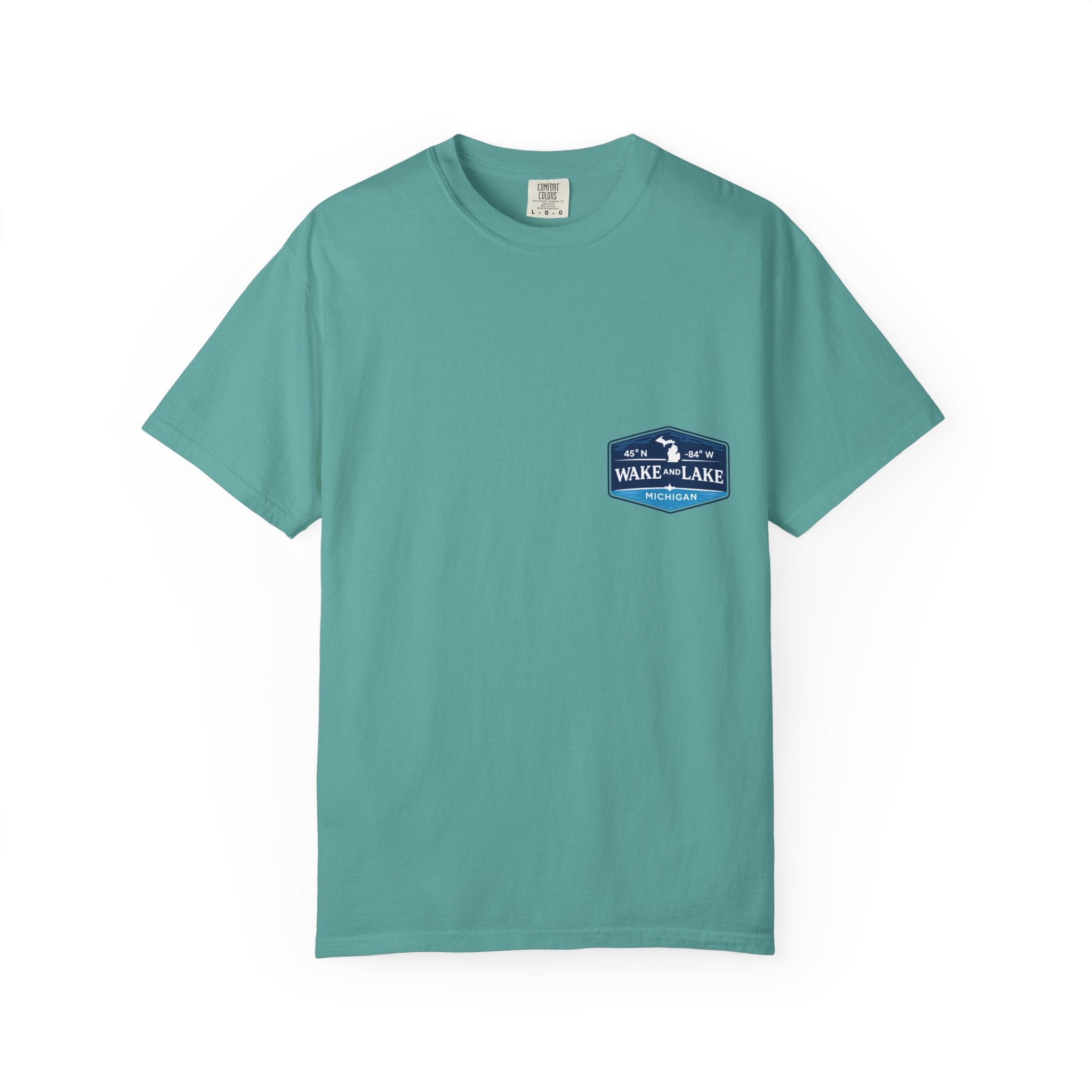 Wake and Lake Michigan Shield Tee worn on a Great Lakes dock
Bold Michigan crest graphic t-shirt for lake life
Michigan boating shirt with Wake and Lake shield logo
Unisex cotton tee with Michigan state pride lake graphic
