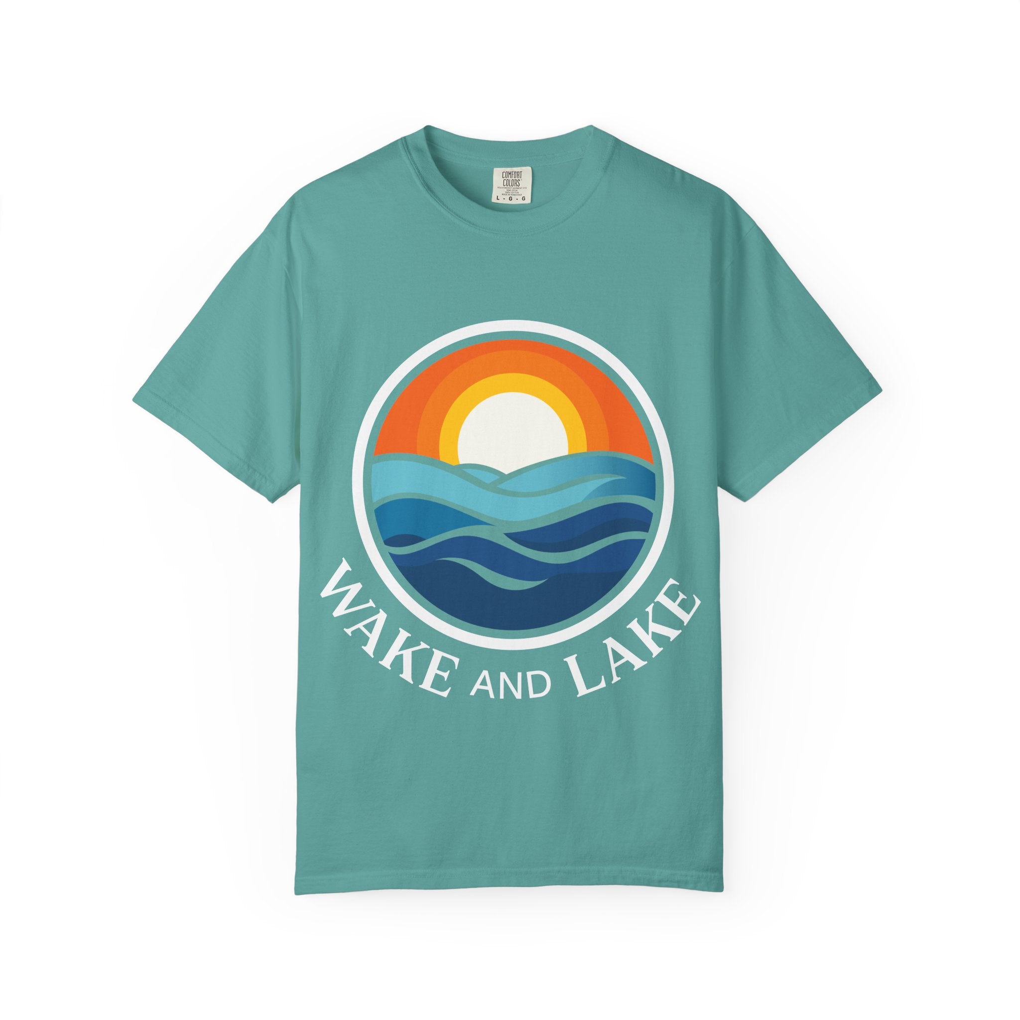 Wake and Lake Life Circle Crest Tee worn on a dock at sunset
Soft unisex lake life tee with bold circle crest graphic
Wake and Lake branded cotton t-shirt for summer boating
Circle crest logo tee for lake days and outdoor weekends


