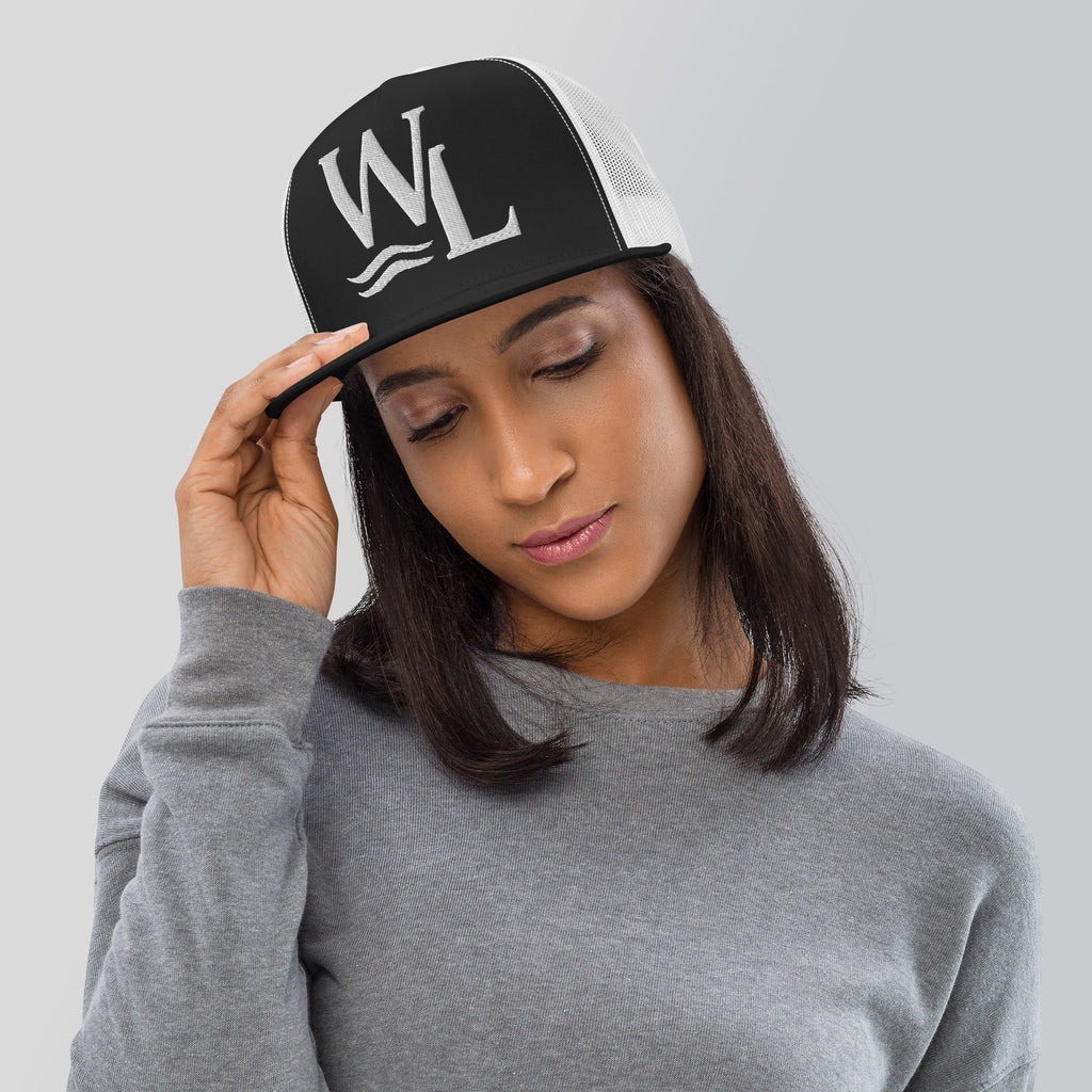 Wake and Lake WL Monogram Trucker Hat worn on a boat at sunrise
Breathable mesh trucker cap with WL monogram for lake life
Adjustable lake trucker hat with Wake and Lake branding
Classic snapback mesh hat with WL logo for boating
