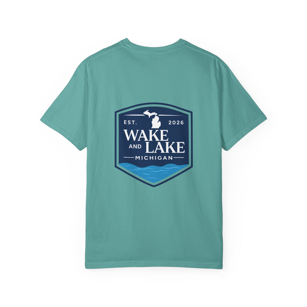 Wake and Lake Michigan Shield Tee worn on a Great Lakes dock
Bold Michigan crest graphic t-shirt for lake life
Michigan boating shirt with Wake and Lake shield logo
Unisex cotton tee with Michigan state pride lake graphic
