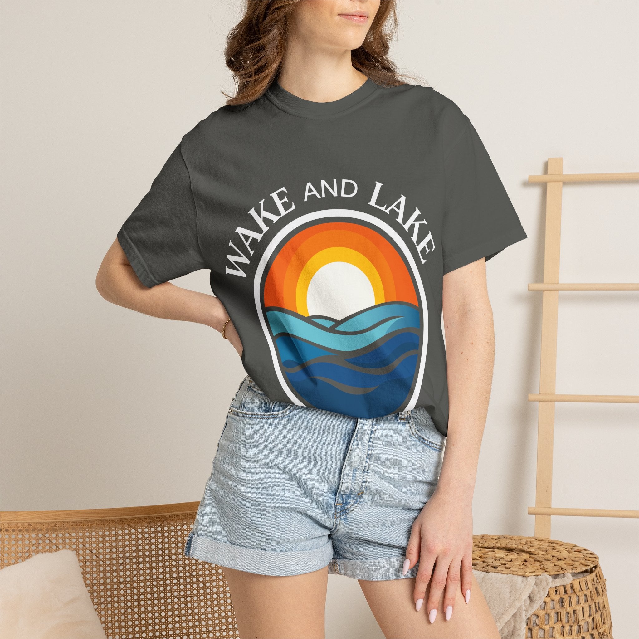 Wake and Lake Circle Crest Arch Tee worn at a lake dock
Lake life t-shirt with arch circle crest logo graphic
Soft unisex summer boating tee with arch design
Wake and Lake branded arch graphic cotton shirt
