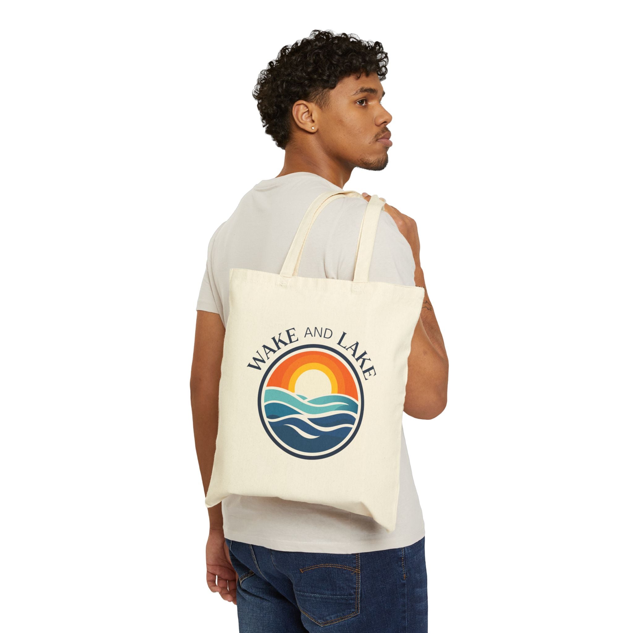 Wake and Lake Circle Crest Canvas Tote Bag on a lakeside bench
Durable canvas lake bag with circle crest logo
Wake and Lake branded canvas carryall for boat days
Circle crest canvas tote for lake day essentials

