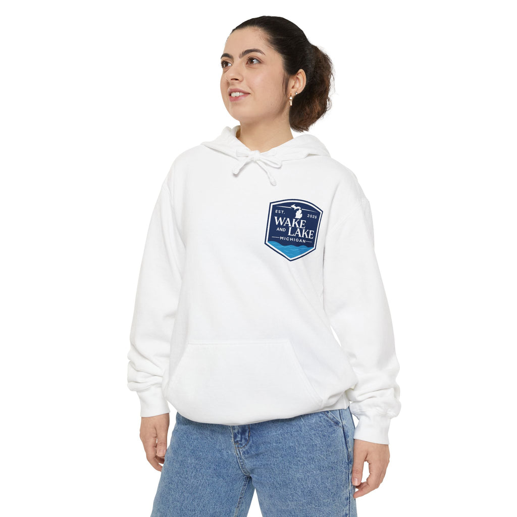 Model wearing the Wake and Lake Michigan Shield Hoodie – Premium in White, front view showing the left-chest shield badge.
