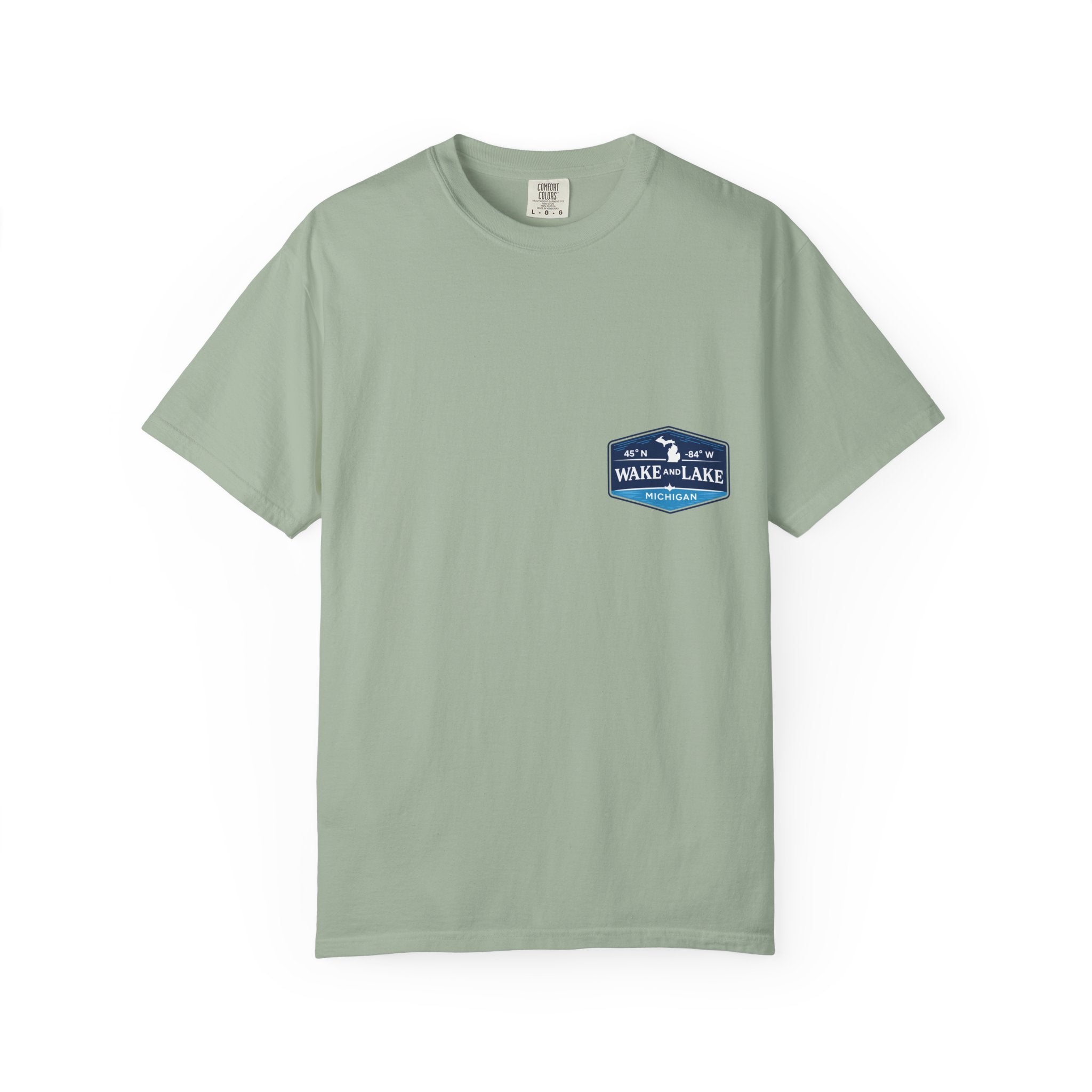 Wake and Lake Michigan Shield Tee worn on a Great Lakes dock
Bold Michigan crest graphic t-shirt for lake life
Michigan boating shirt with Wake and Lake shield logo
Unisex cotton tee with Michigan state pride lake graphic
