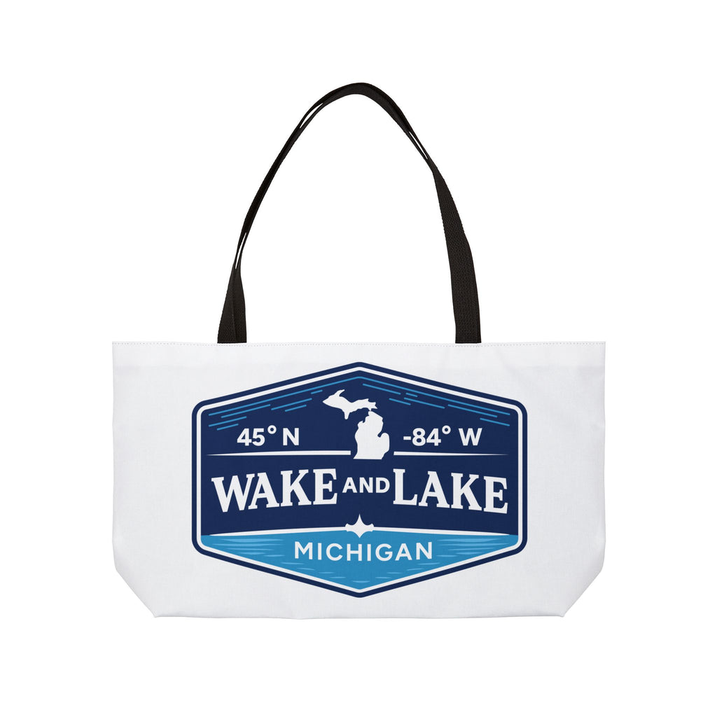 Wake and Lake Michigan Weekender Tote Bag at a Great Lakes dock
Spacious Michigan lake tote bag with shield graphic
Durable Michigan canvas carryall for lake trips and boating
Great Lakes weekend bag with Wake and Lake Michigan branding
