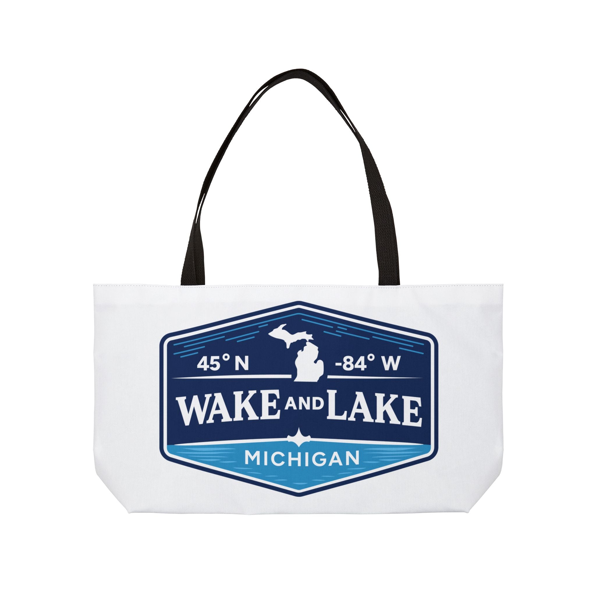 Wake and Lake Michigan Weekender Tote Bag at a Great Lakes dock
Spacious Michigan lake tote bag with shield graphic
Durable Michigan canvas carryall for lake trips and boating
Great Lakes weekend bag with Wake and Lake Michigan branding
