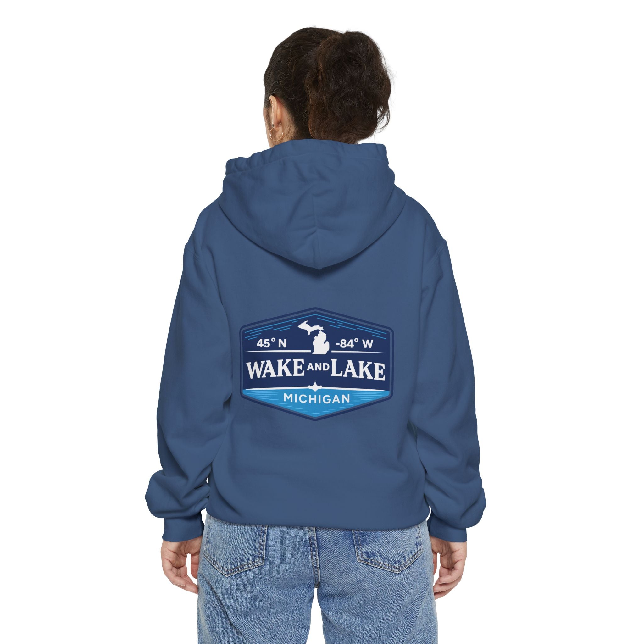 Wake and Lake Life Circle Crest Hoodie Light worn on a summer boat morning
Light-colored lake life sweatshirt with circle crest graphic
Natural white or sand lake hoodie for warm summer days
Soft light fleece with Wake and Lake circle crest design

