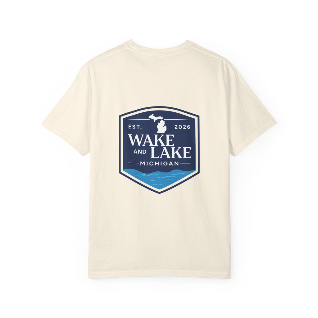 Wake and Lake Michigan Shield Tee worn on a Great Lakes dock
Bold Michigan crest graphic t-shirt for lake life
Michigan boating shirt with Wake and Lake shield logo
Unisex cotton tee with Michigan state pride lake graphic
