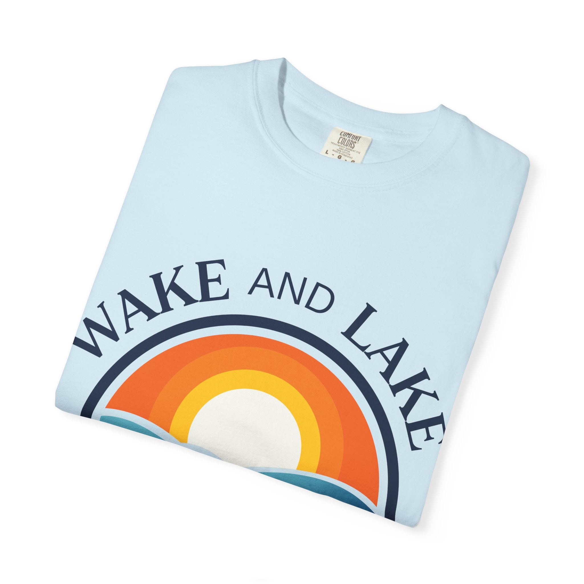 Wake and Lake Life Circle Crest Tee light color on a sunny lake day
White or sand-colored unisex lake t-shirt with circle crest logo
Light summer boating shirt with Wake and Lake branding
Breathable cotton lake life tee in light colorway
