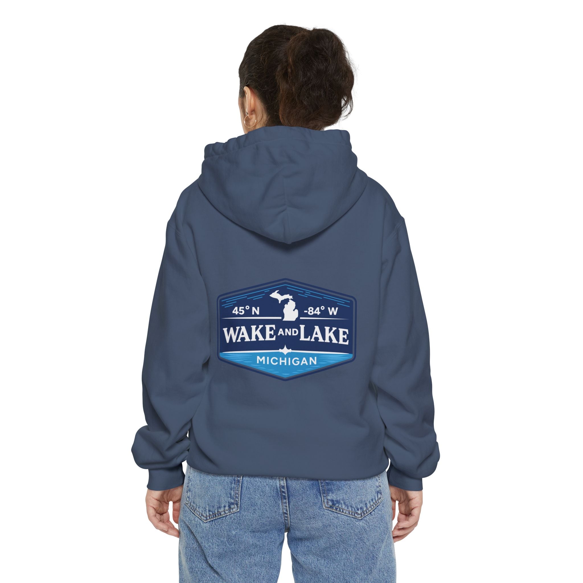 Wake and Lake Life Circle Crest Hoodie Light worn on a summer boat morning
Light-colored lake life sweatshirt with circle crest graphic
Natural white or sand lake hoodie for warm summer days
Soft light fleece with Wake and Lake circle crest design

