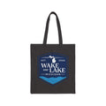 Wake and Lake Michigan Canvas Tote Bag at a Great Lakes shoreline
Michigan shield canvas carryall tote for lake days
Durable Michigan lake bag with Wake and Lake branding
Great Lakes canvas tote bag with Michigan shield graphic
