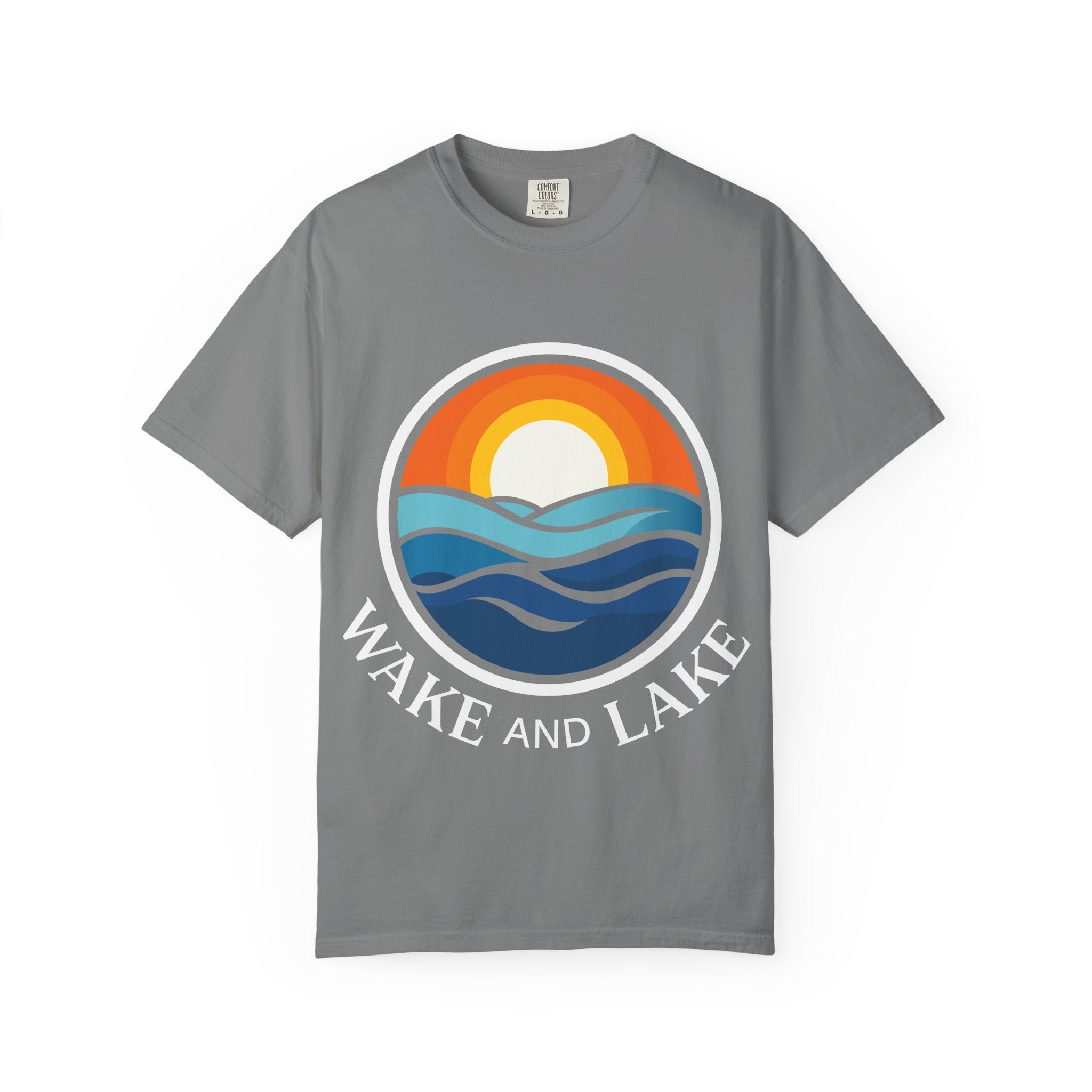 Wake and Lake Life Circle Crest Tee worn on a dock at sunset
Soft unisex lake life tee with bold circle crest graphic
Wake and Lake branded cotton t-shirt for summer boating
Circle crest logo tee for lake days and outdoor weekends

