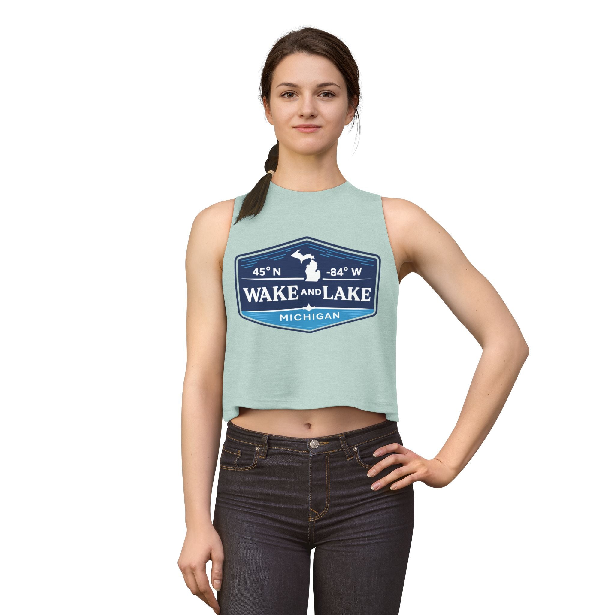 Wake and Lake Michigan Shield Women's Crop Tee – Fitted, sleeveless, seafoam, model with front view.