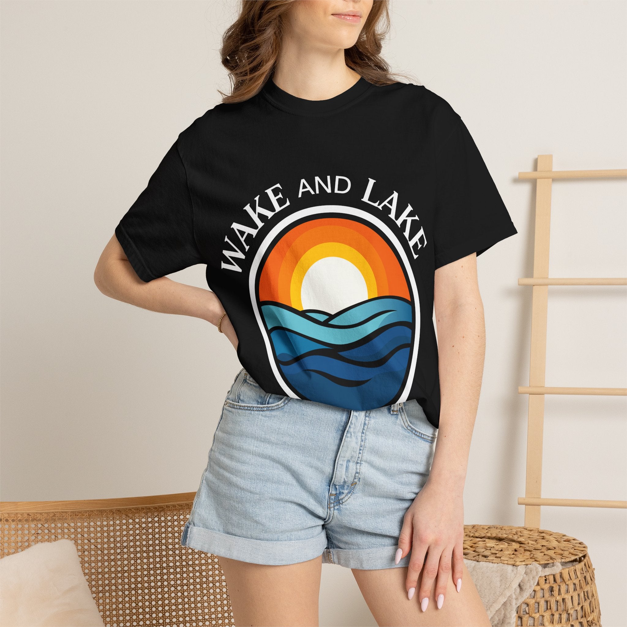 Wake and Lake Circle Crest Arch Tee worn at a lake dock
Lake life t-shirt with arch circle crest logo graphic
Soft unisex summer boating tee with arch design
Wake and Lake branded arch graphic cotton shirt
