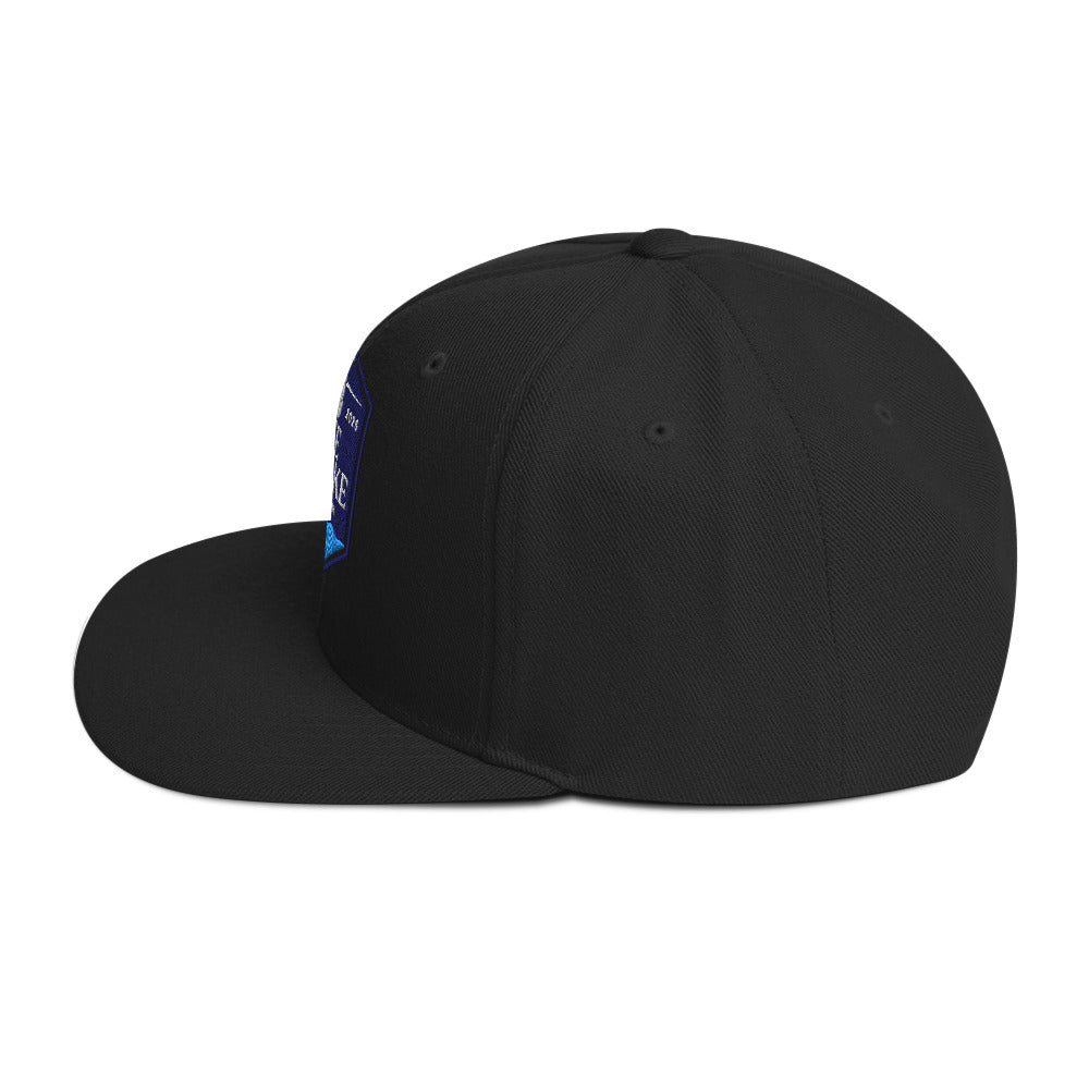 Classic snapback style hat, black, side view
