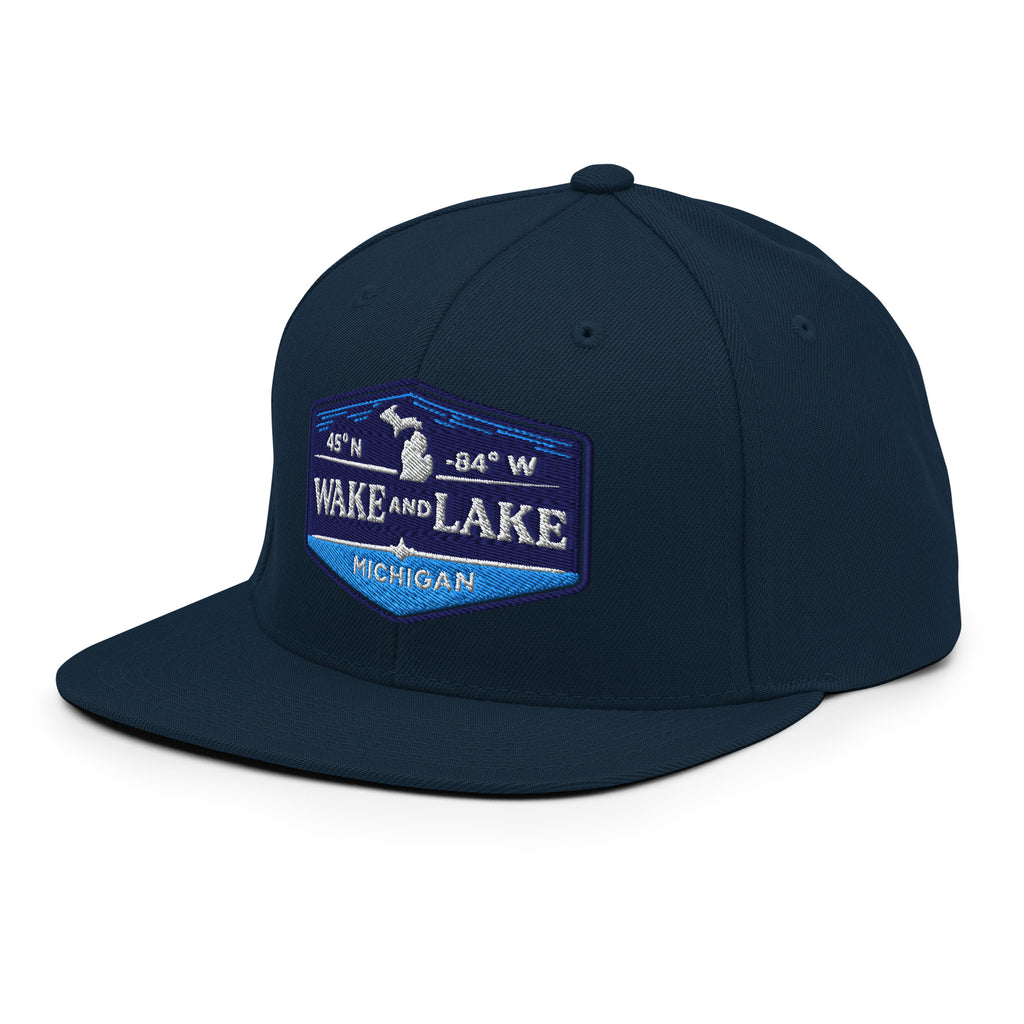 Classic Snap Back Hat, Wake and Lake Coordinate Badge, navy, front view