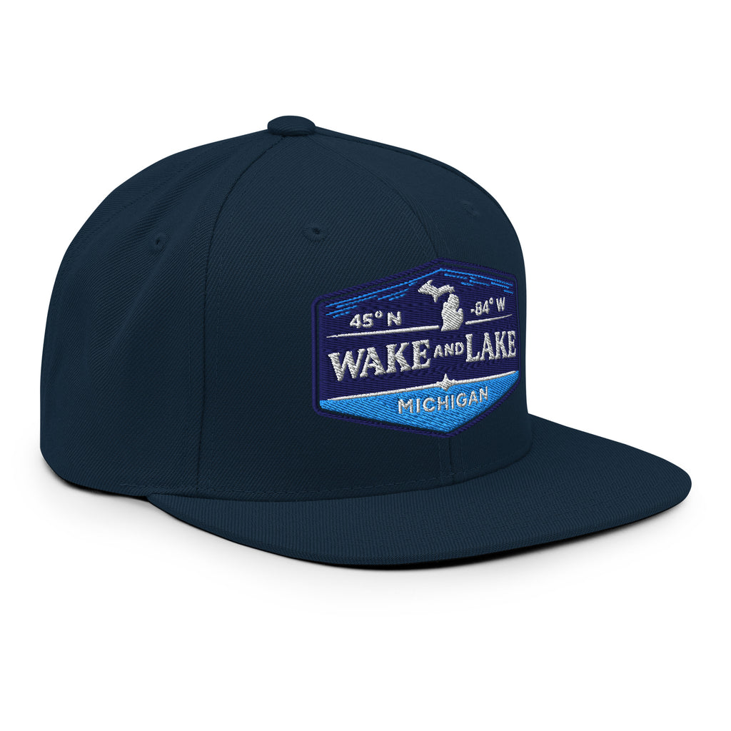 Classic Snap Back Hat, Wake and Lake Coordinate Badge, navy, front view