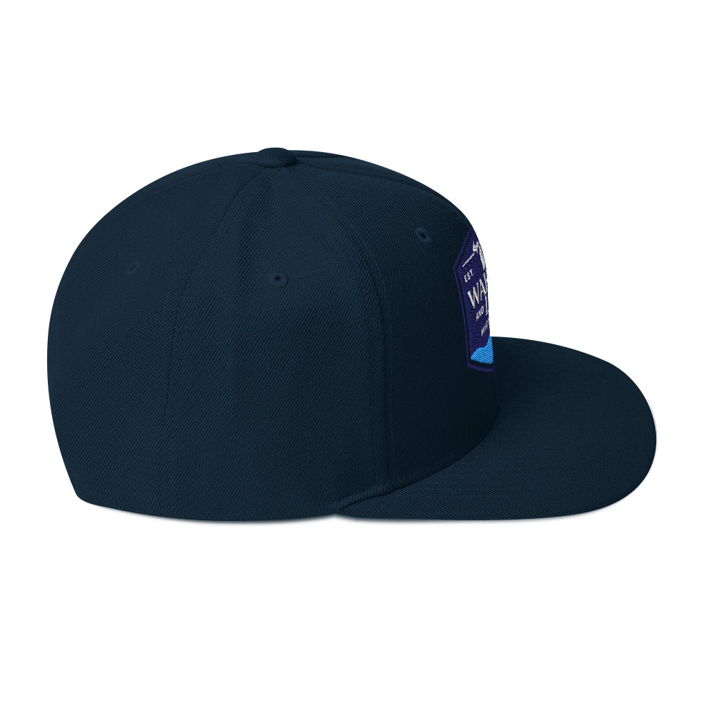 Classic snapback style hat, navy, side view