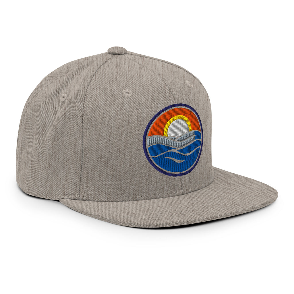 Wake and Lake Circle Crest Snapback Hat worn backwards on a lake boat
Structured snapback lake life hat with circle crest embroidery
Boating snapback cap with Wake and Lake branding
Adjustable circle crest hat for summer lake days
