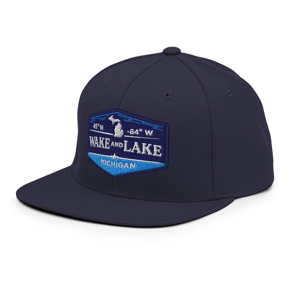 Classic Snap Back Hat, Wake and Lake Coordinate Badge, Navy, front view