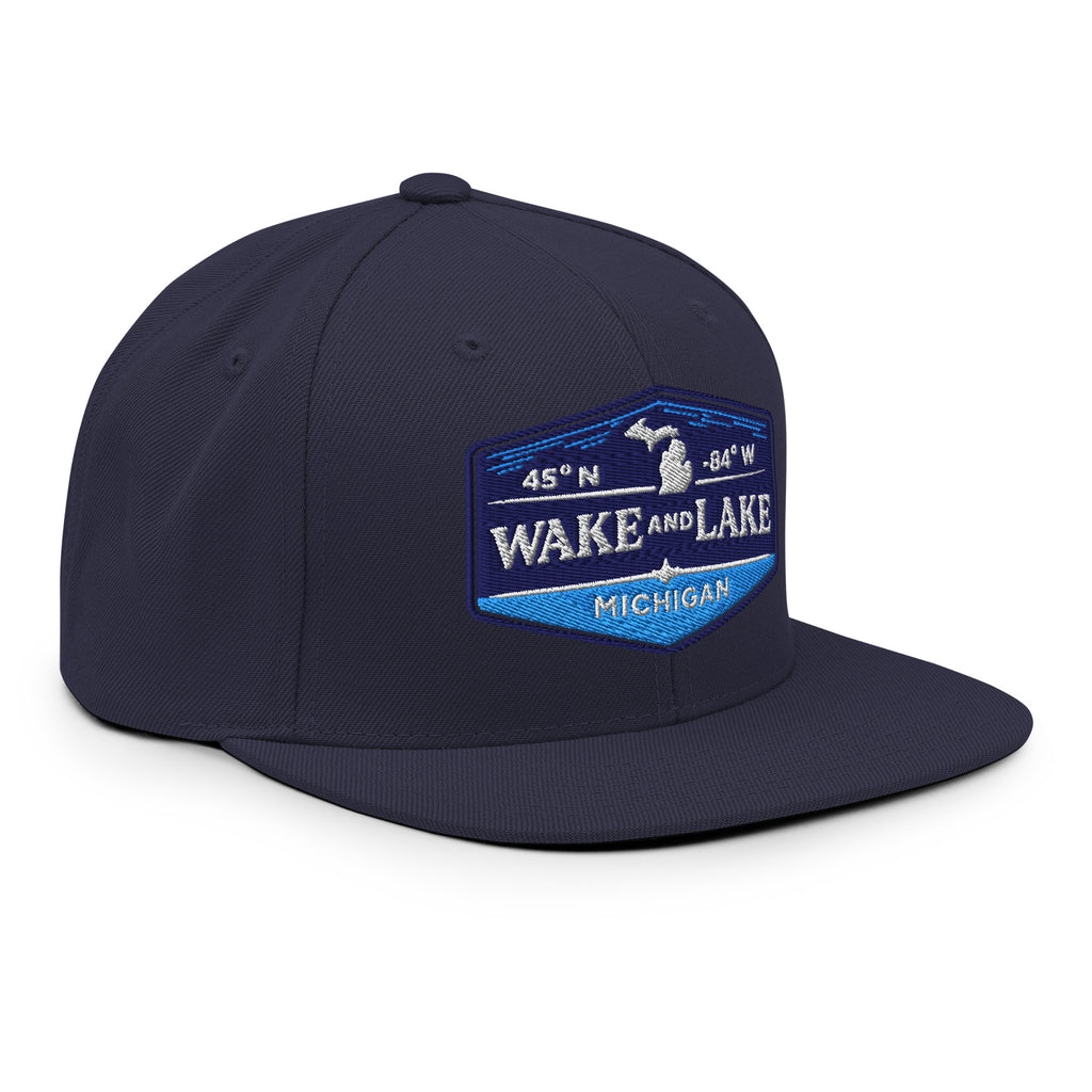 Classic Snap Back Hat, Wake and Lake Coordinate Badge, Navy, front view
