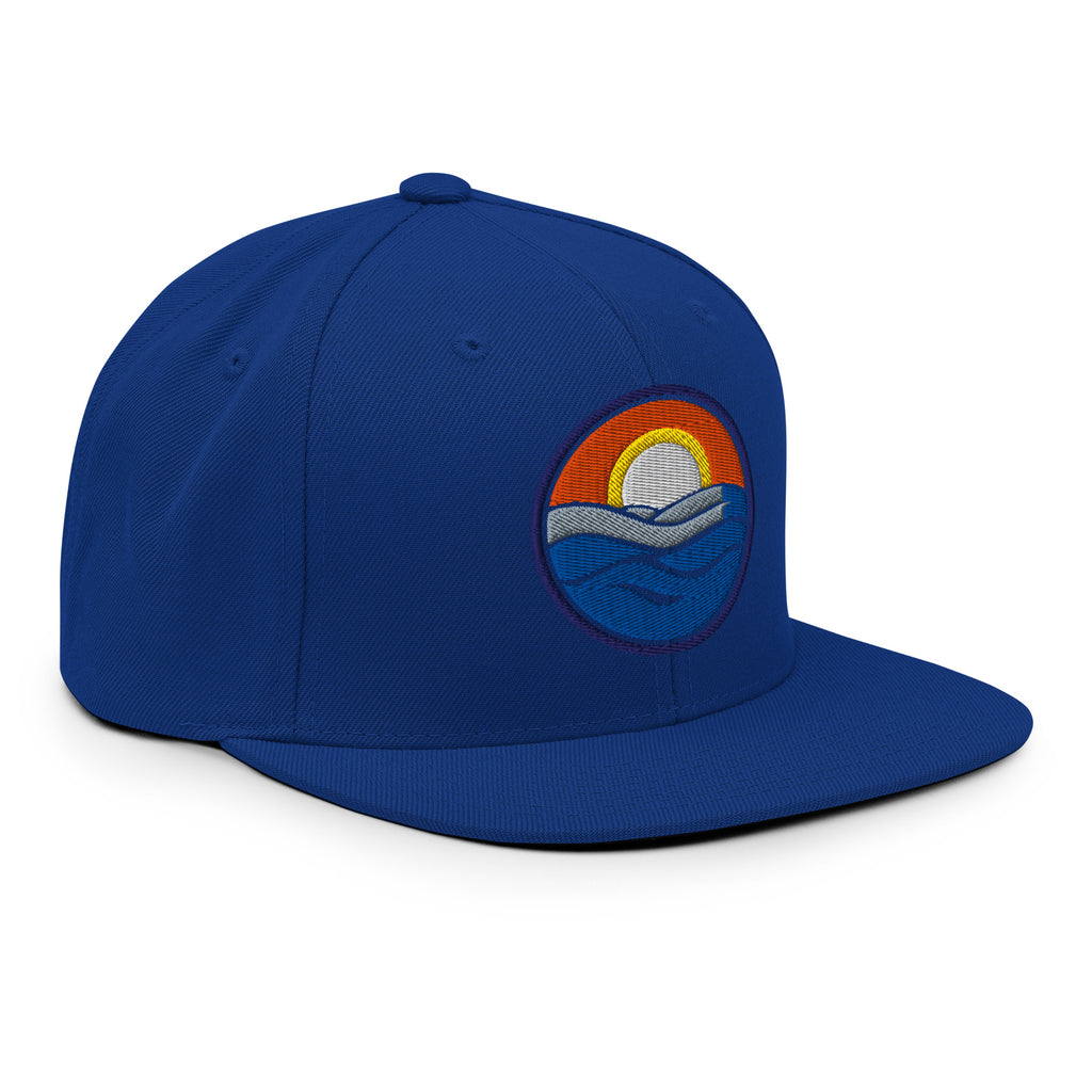 Wake and Lake Circle Crest Snapback Hat worn backwards on a lake boat
Structured snapback lake life hat with circle crest embroidery
Boating snapback cap with Wake and Lake branding
Adjustable circle crest hat for summer lake days
