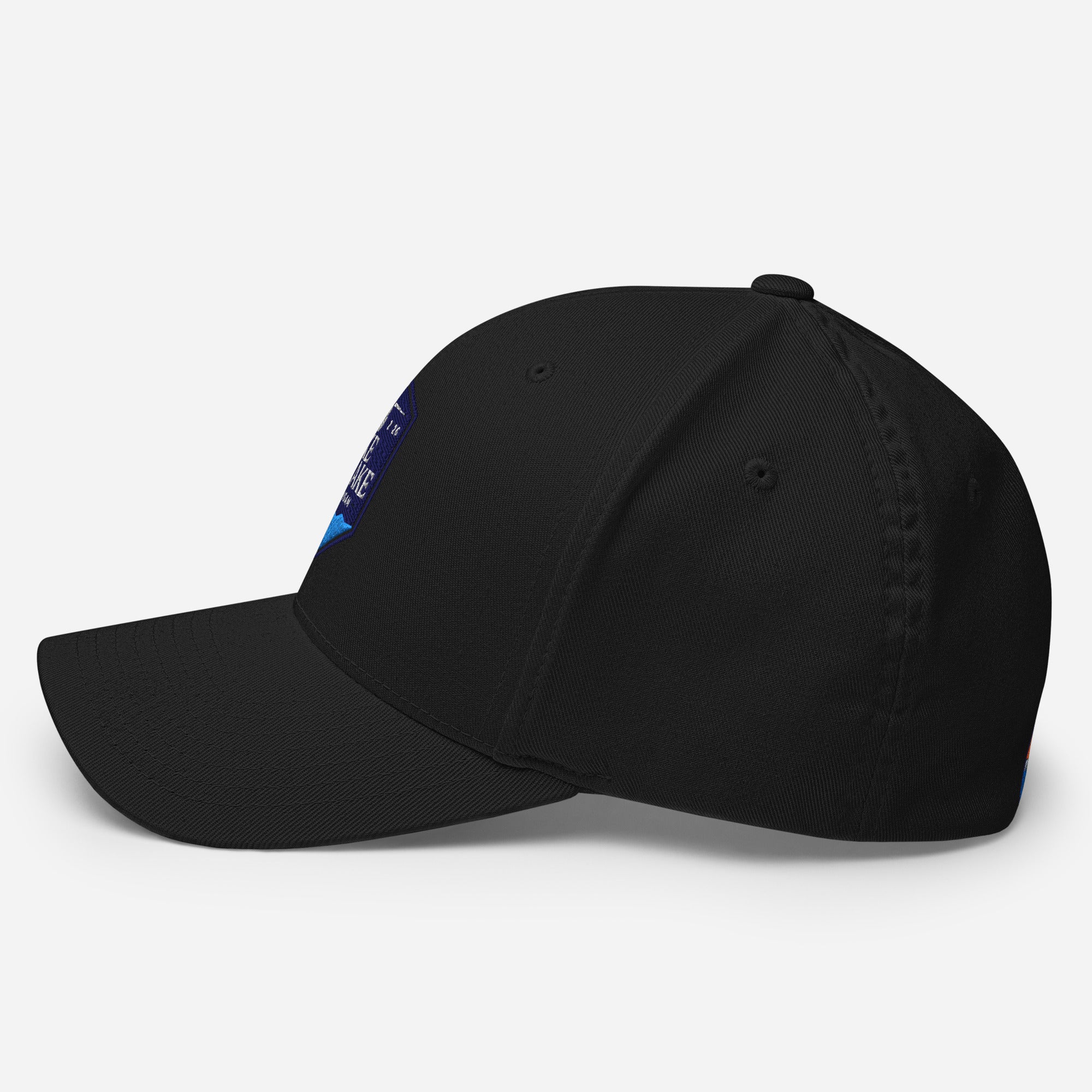 Wake and Lake Michigan Shield FlexFit Hat, Black with Coordinate badge on the front, and Circle Crest logo on the back, side view
