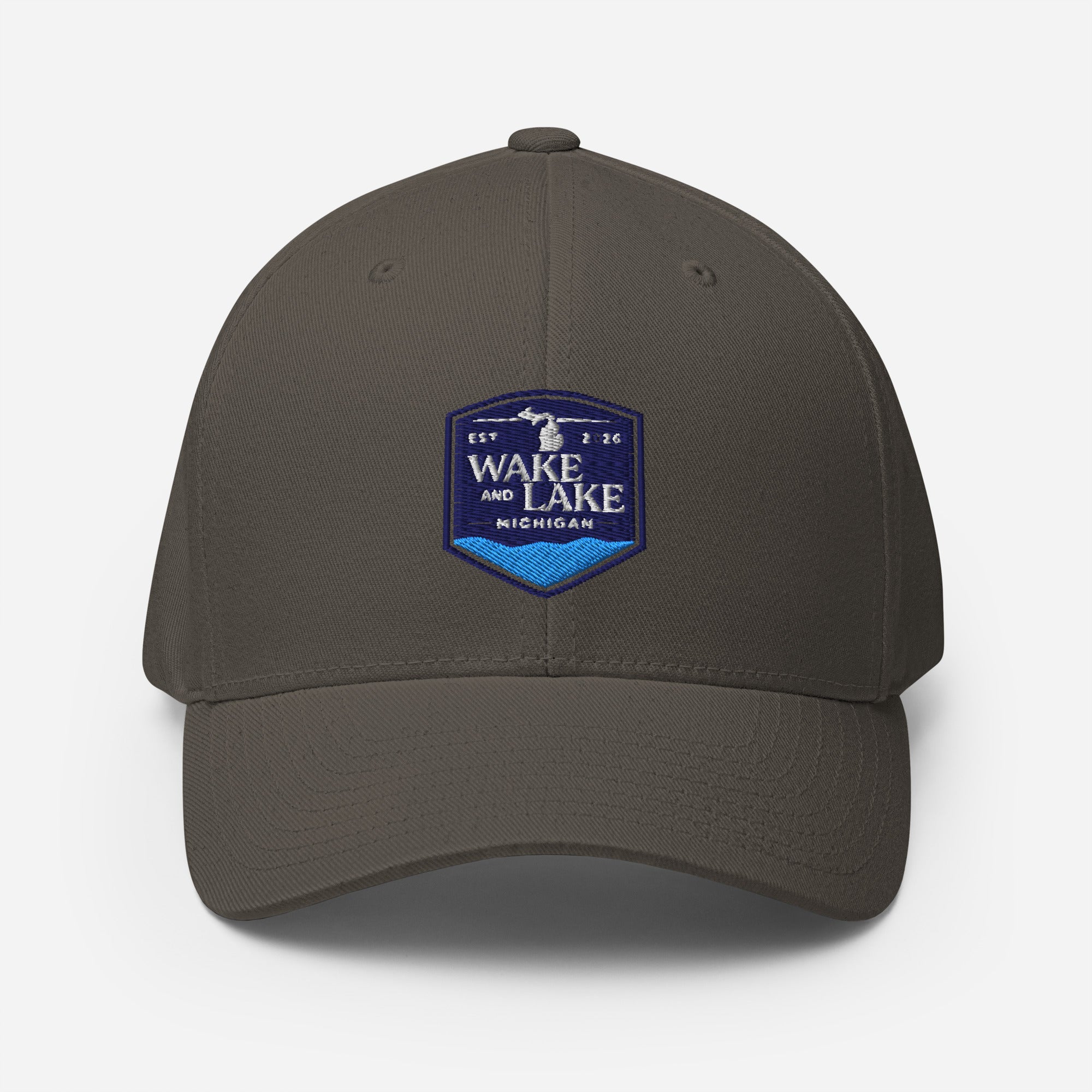 Wake and Lake Michigan Shield FlexFit Hat, dark grey with Coordinate badge on the front, and Circle Crest logo on the back, front view