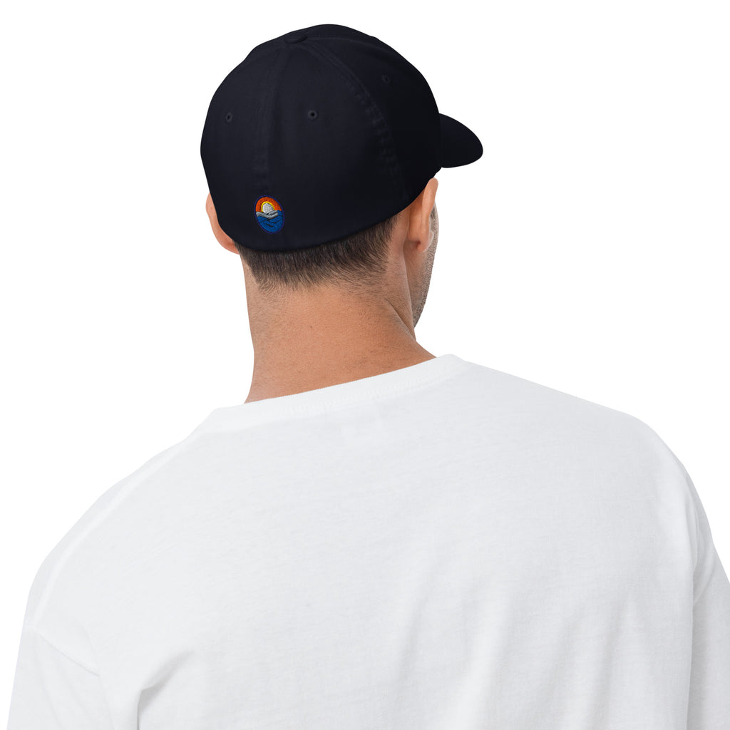 Wake and Lake Michigan Shield FlexFit Hat, Dark Navy with Coordinate badge on the front, and Circle Crest logo on the back, rear view