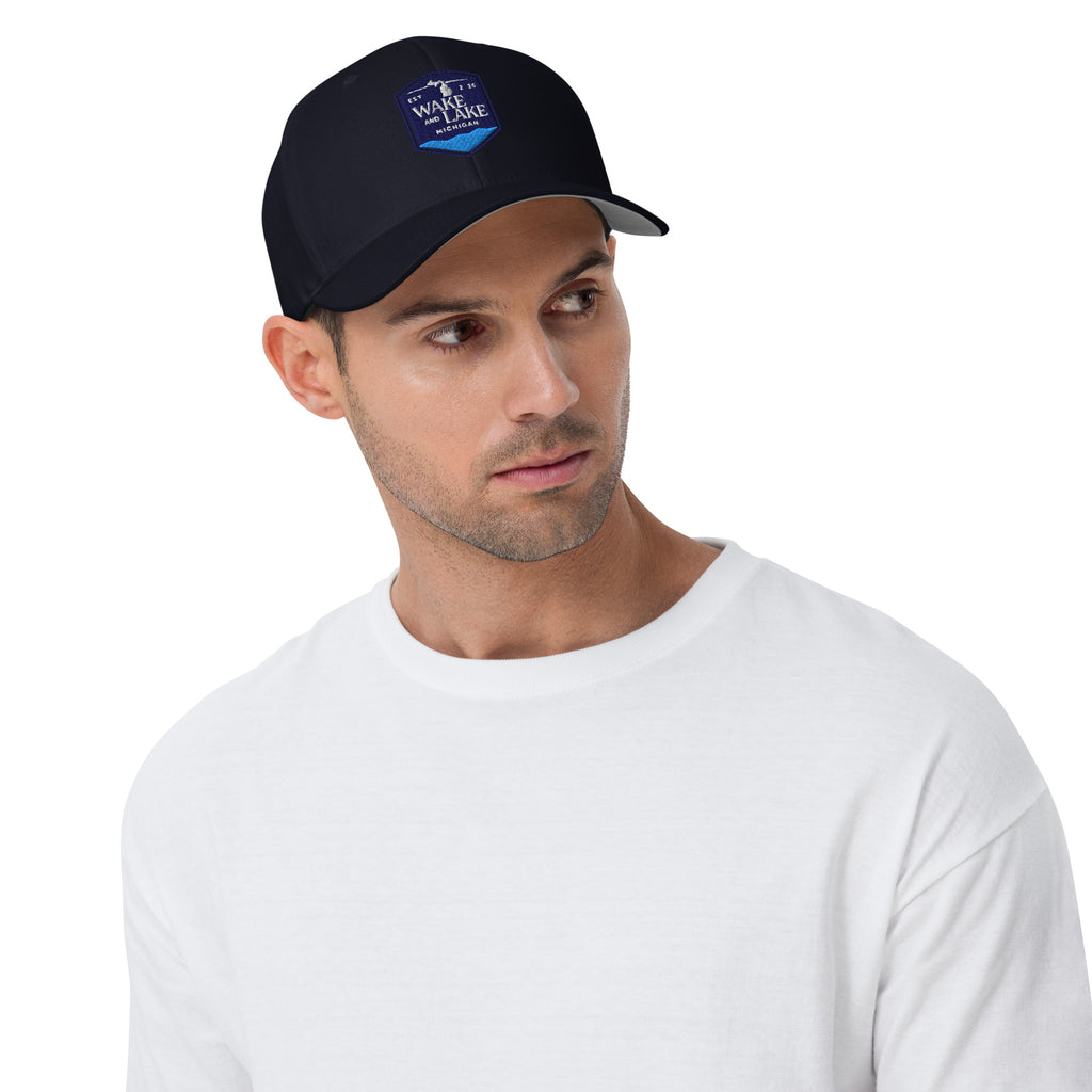Wake and Lake Michigan Shield FlexFit Hat, Dark Navy with Coordinate badge on the front, and Circle Crest logo on the back