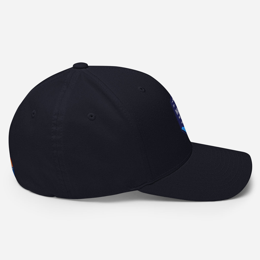 Wake and Lake Michigan Shield FlexFit Hat, Dark Navy with Coordinate badge on the front, and Circle Crest logo on the back, side view